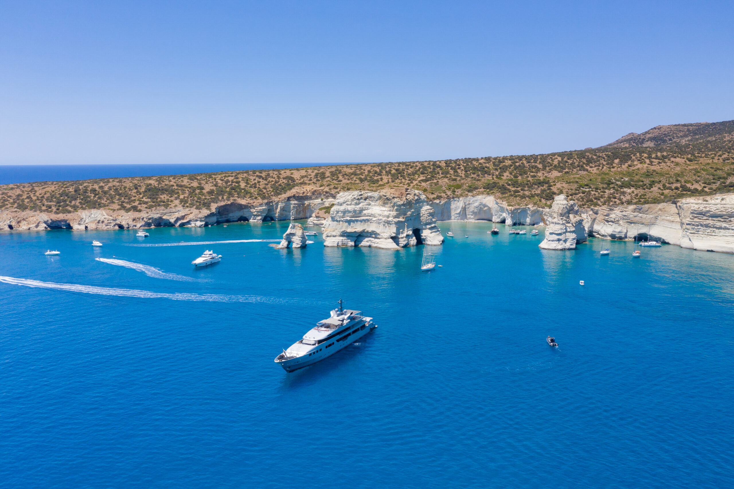 Motor yacht anchored at Kleftiko on Milos, Greece