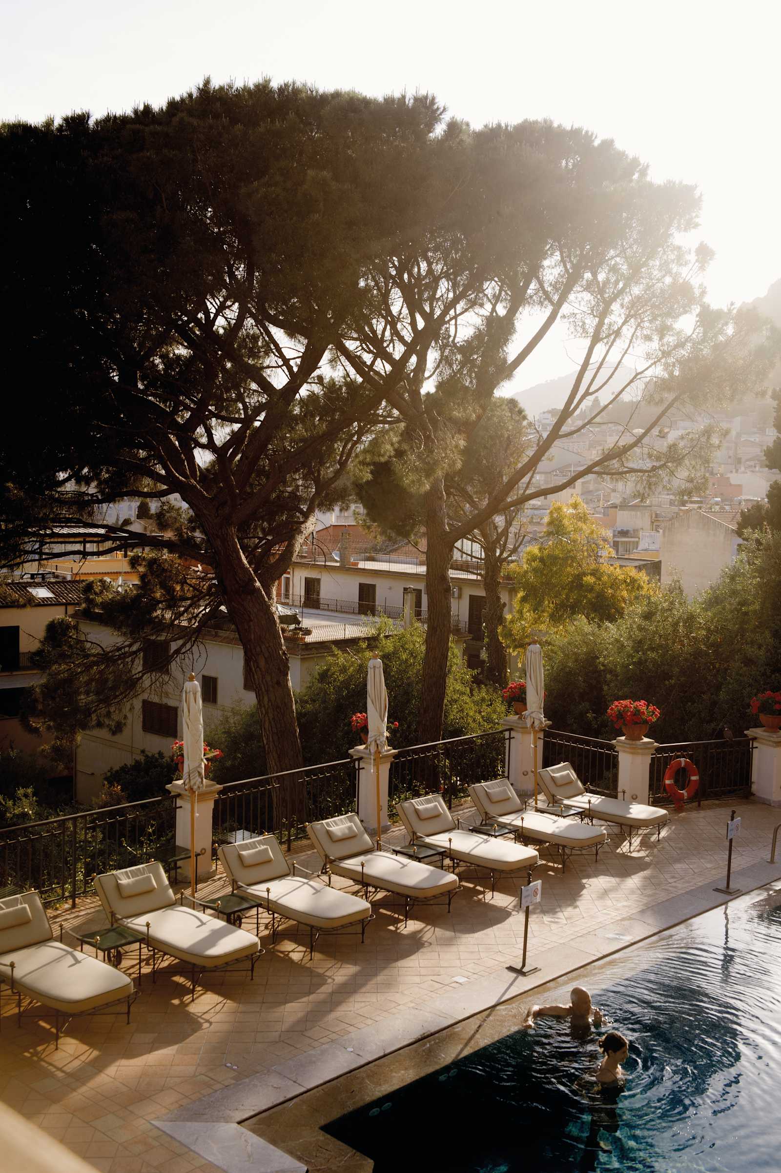 Grand Hotel Timeo pool area with Mediterranean garden setting