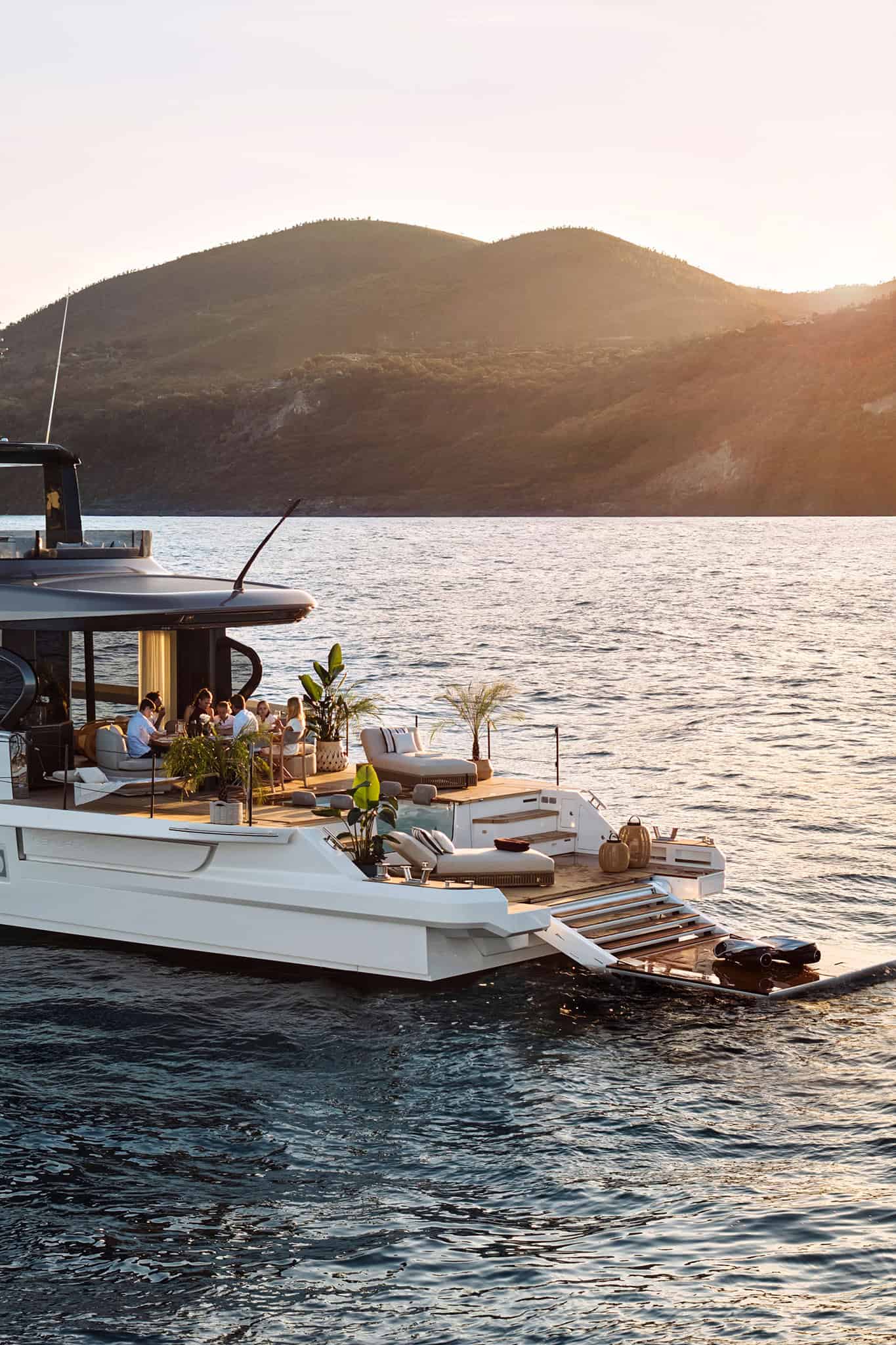 Azimut Seadeck 9 stern with its terraces open beside the water