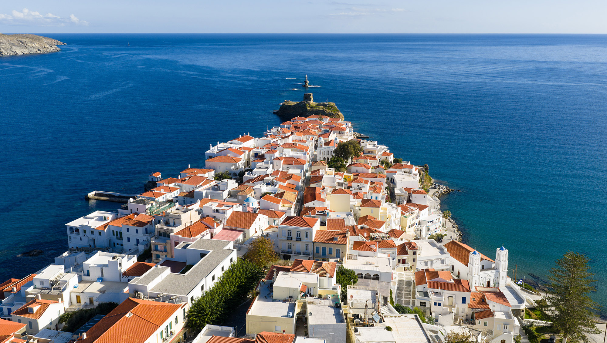 Cycladic settlement and Aegean coastline viewed from above