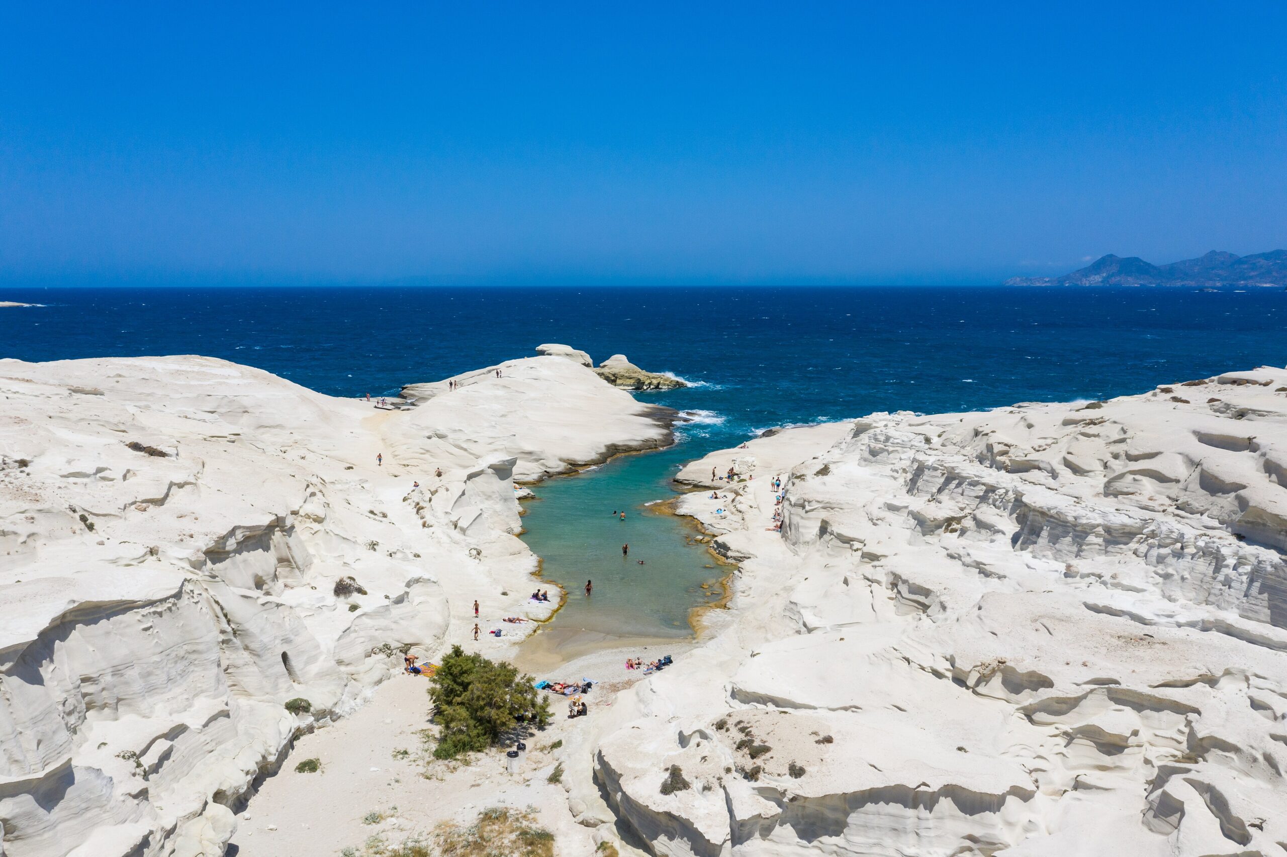 White volcanic coast and blue Aegean Sea at Sarakiniko on Milos