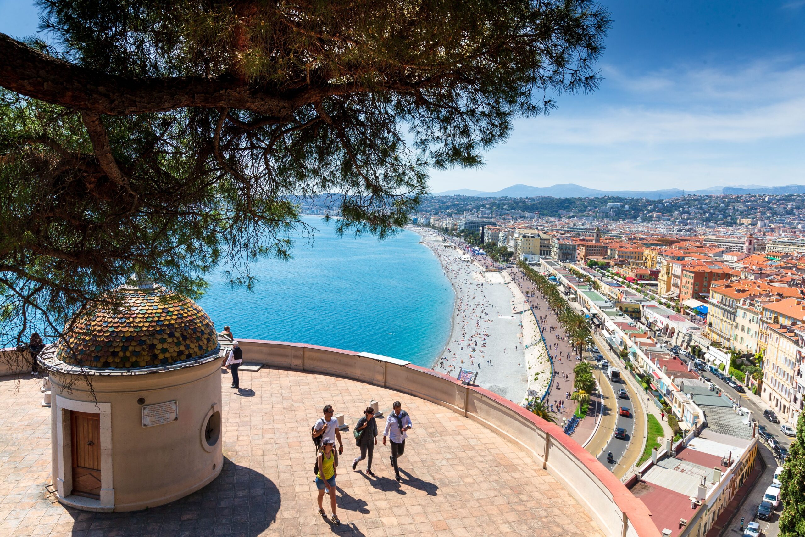Elevated view across Nice, the waterfront and the dense coastal road corridor