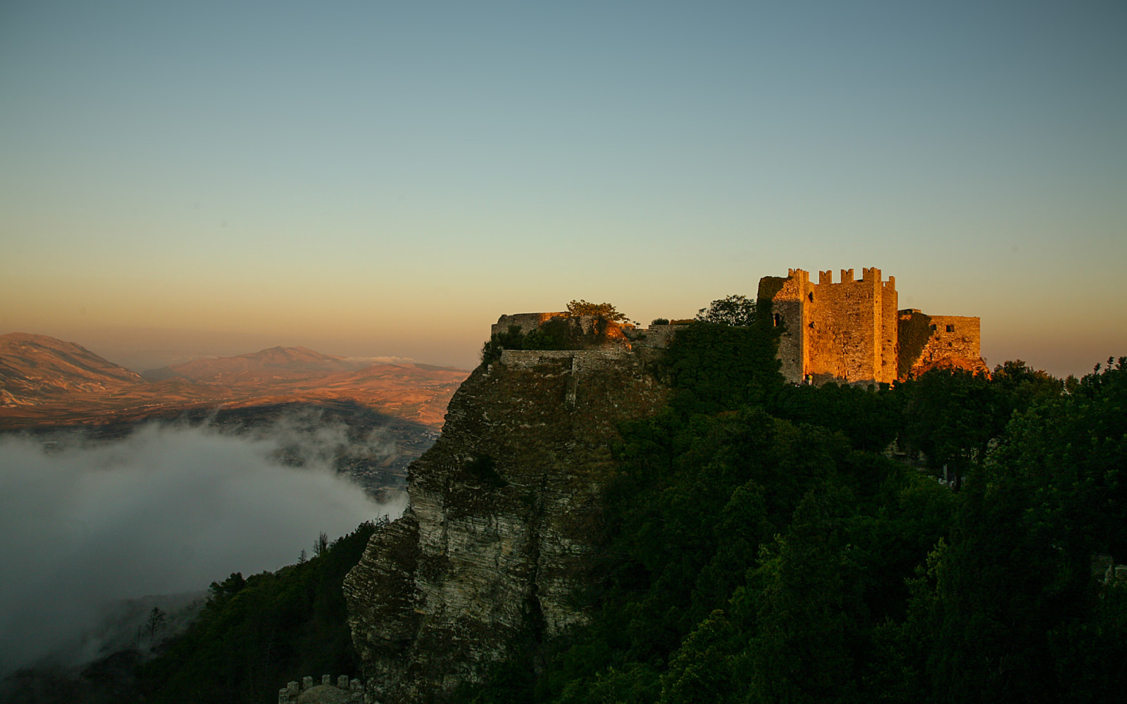 Historic stone architecture at Erice above the western Sicilian landscape