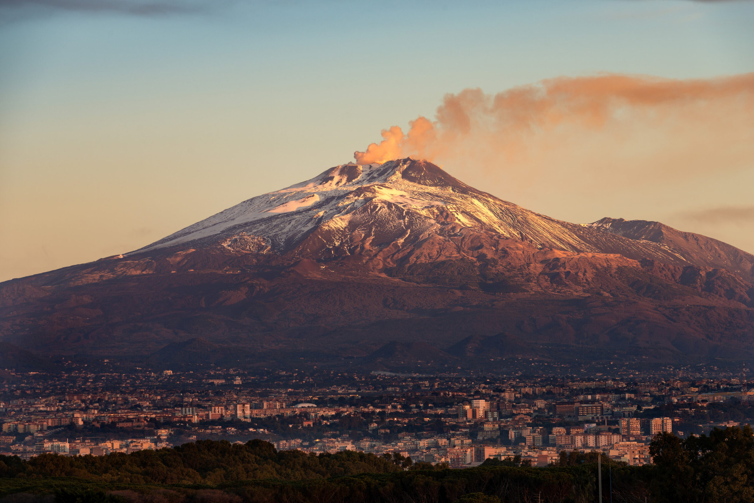 Mount Etna rising above eastern Sicily at sunset
