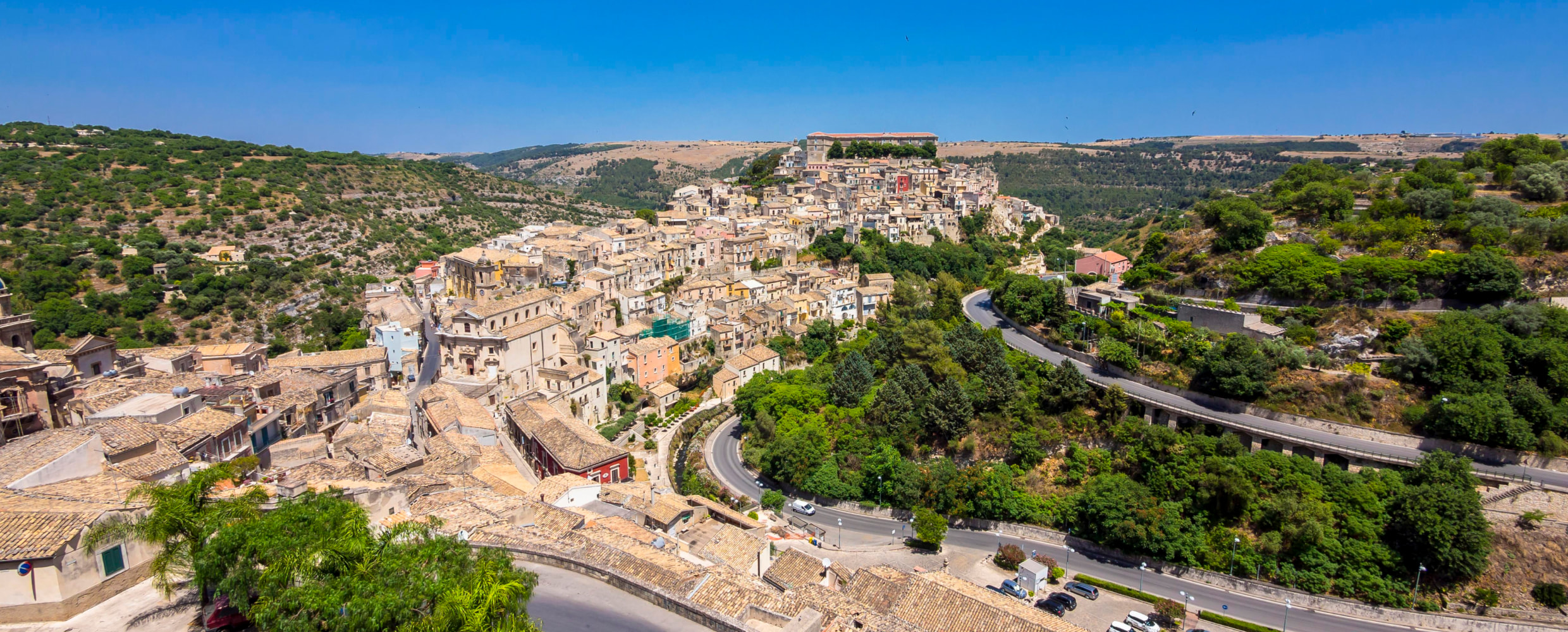 Panoramic view across a baroque hill town in the Val di Noto