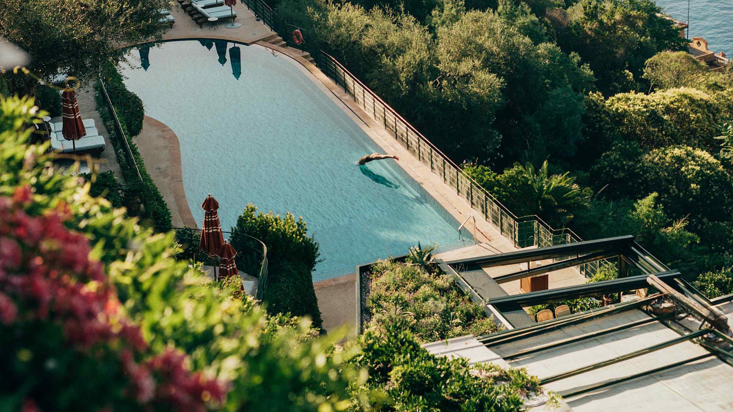 Elevated saltwater pool at Splendido surrounded by the hillside above Portofino