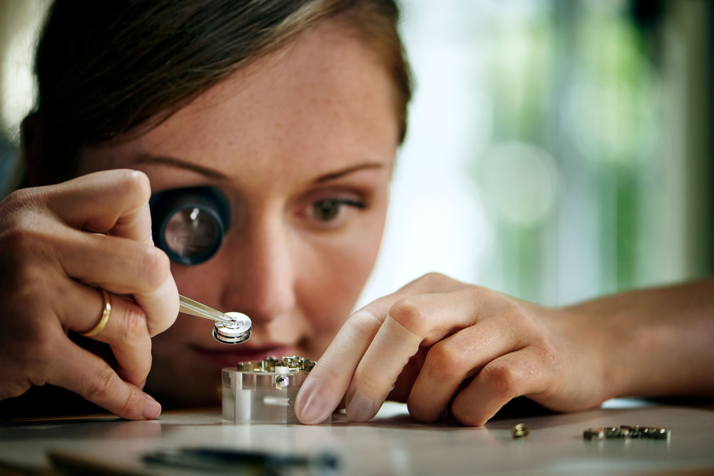An official making-of view of work at the watchmaker's bench