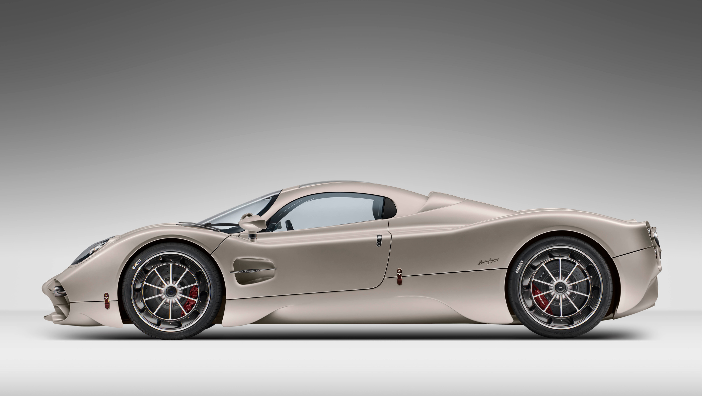 The original coupé silhouette in side-profile studio visual