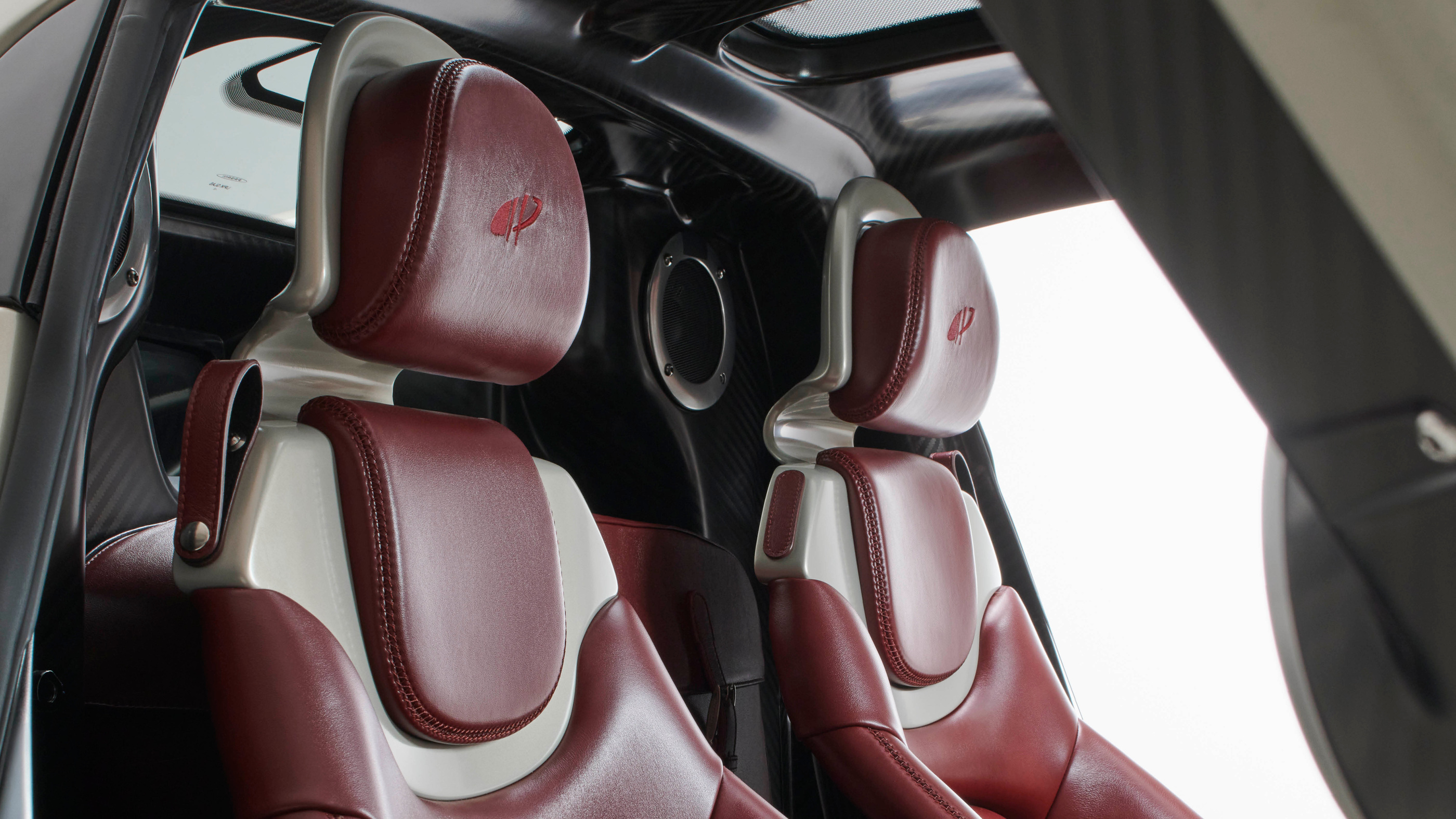 The two-seat cabin and its leather surfaces