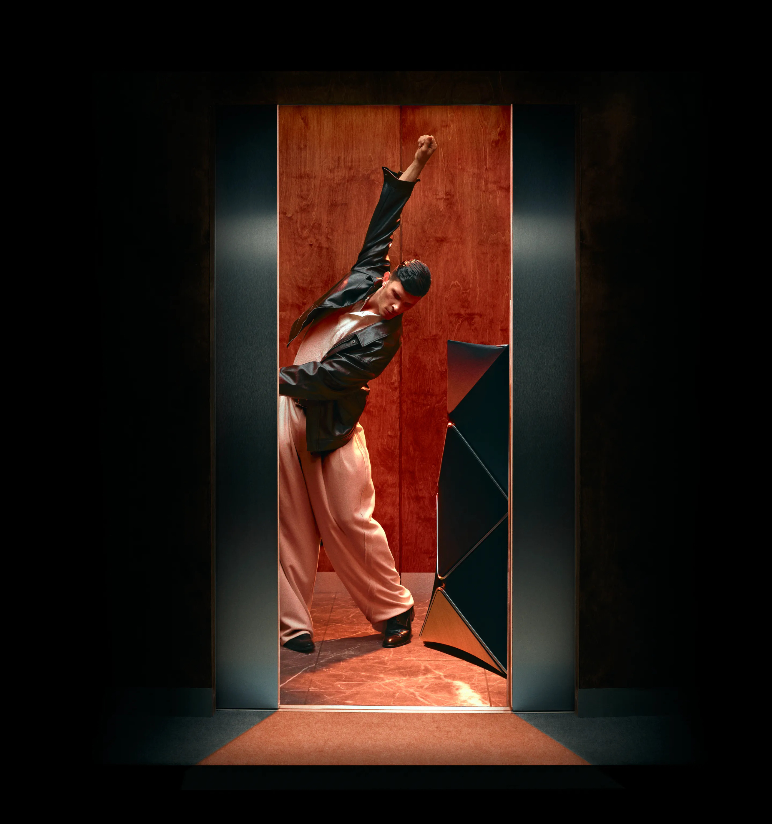 Beolab 90 in the official campaign setting with a person for visual scale