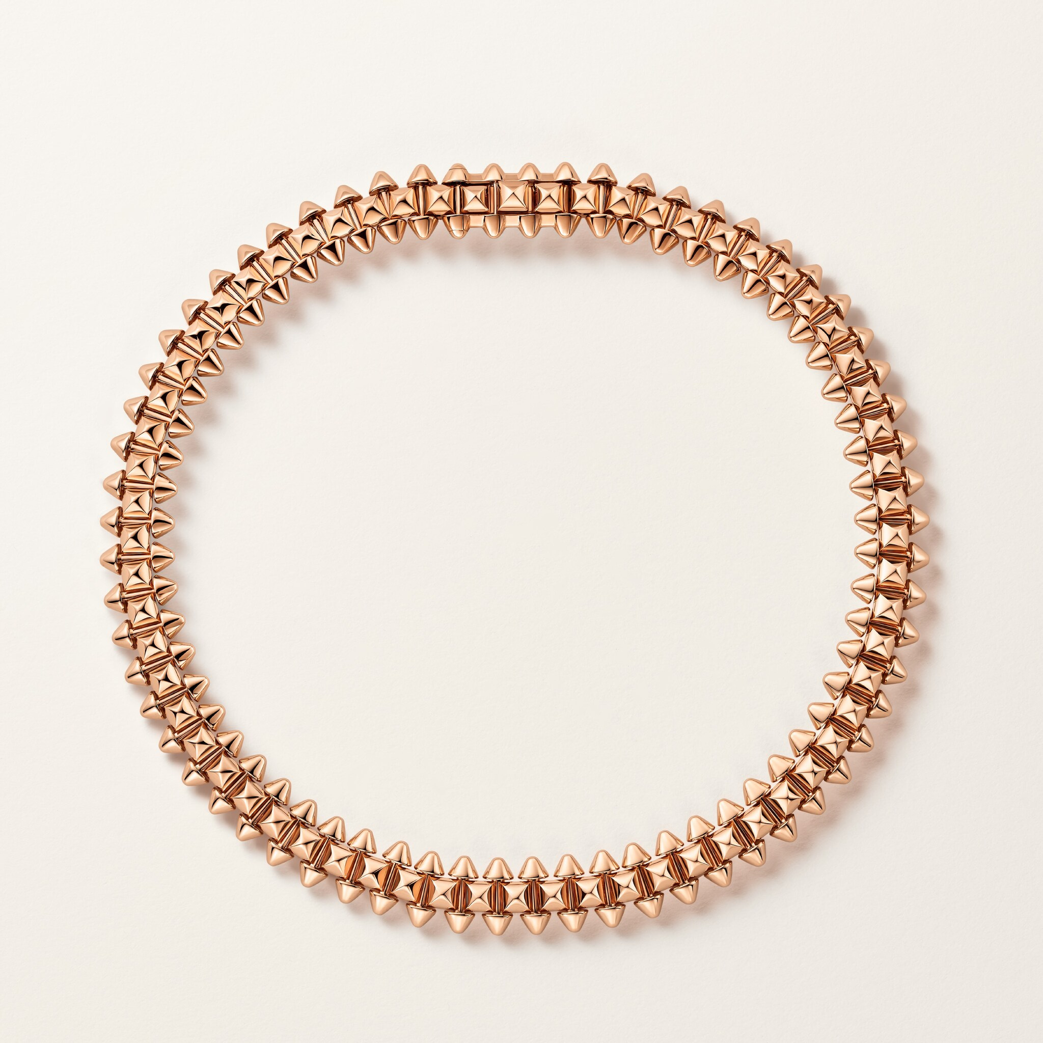 A top view of the rose-gold-coloured Clash bracelet