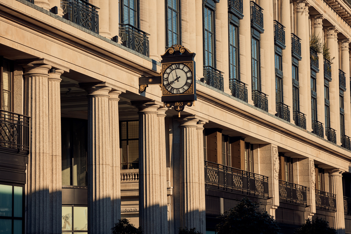 The Whiteley façade and projecting clock in the official property photograph