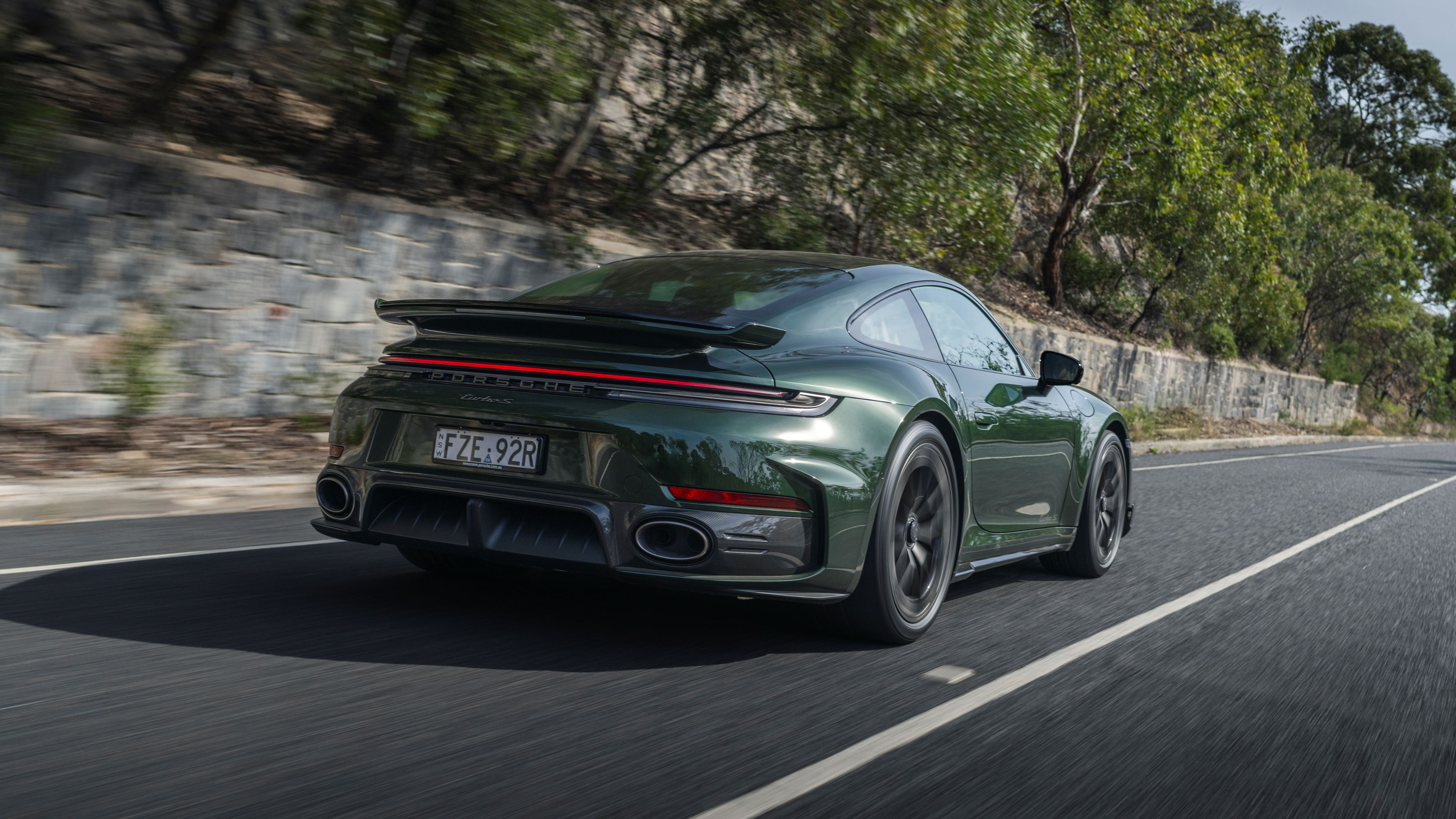 Rear view of the current Turbo S family in official Porsche photography