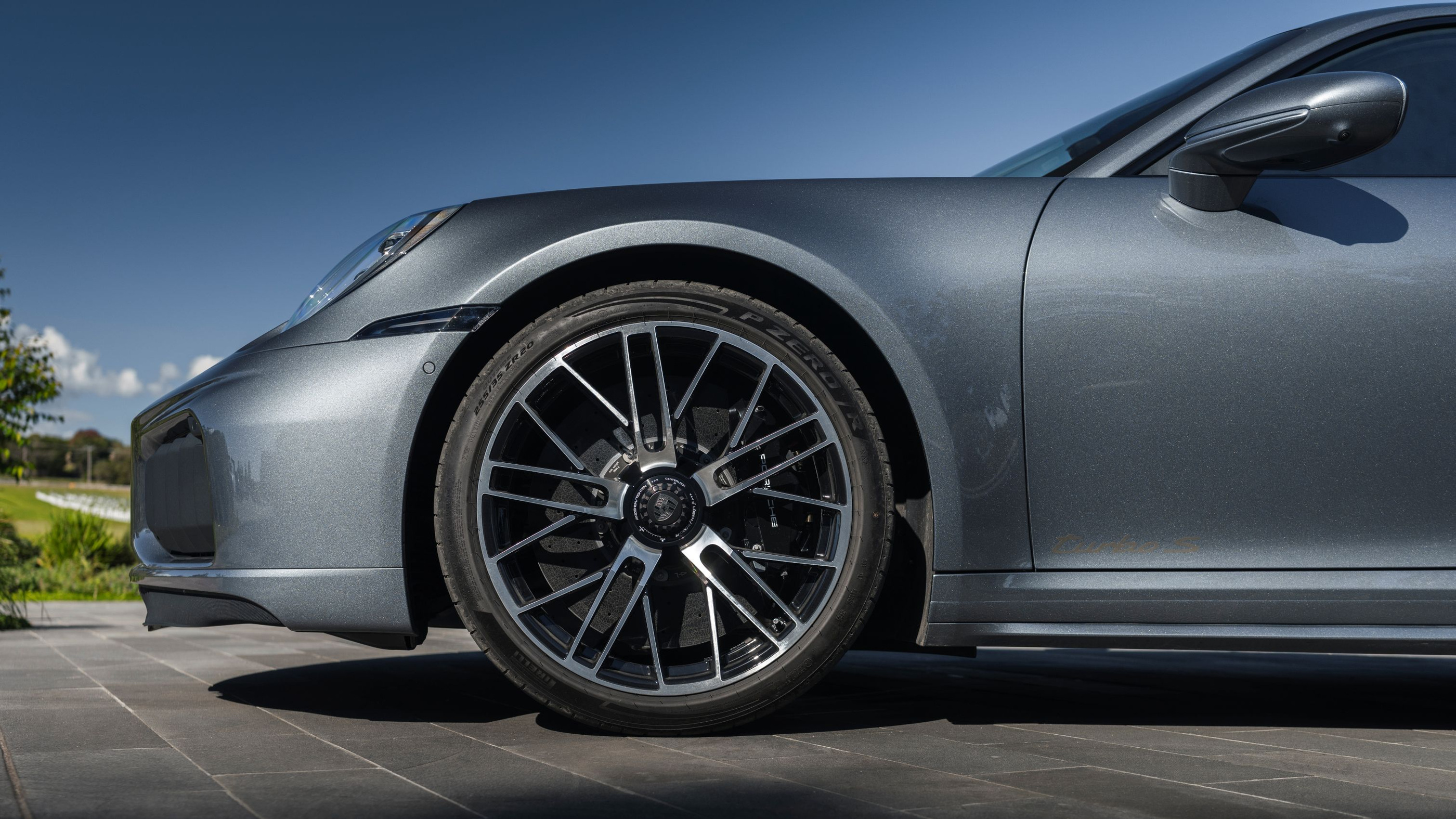 Front wheel and surrounding body in the official detail photograph