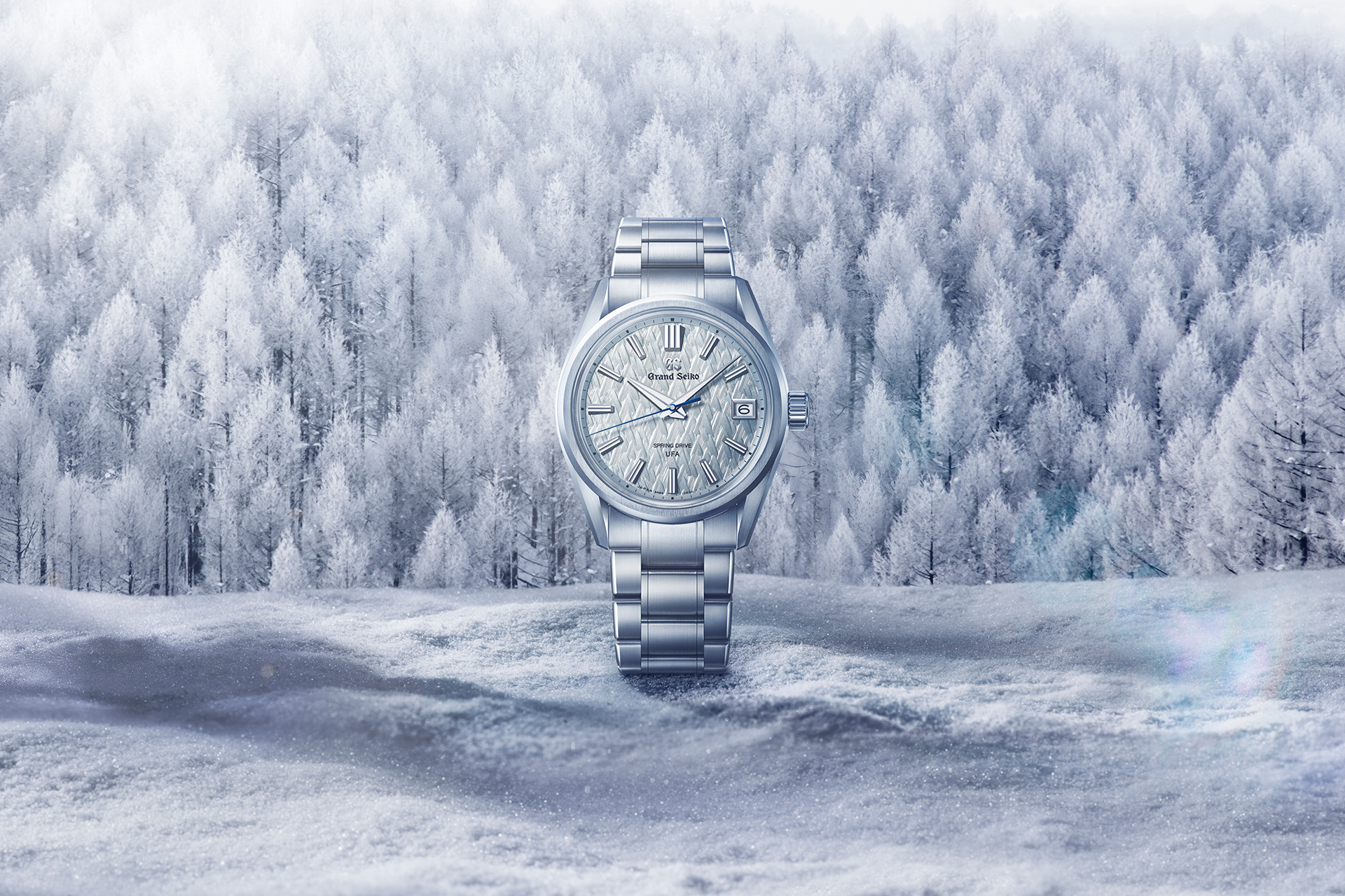 Official SLGB003 campaign visual combining the watch with an ice-forest setting
