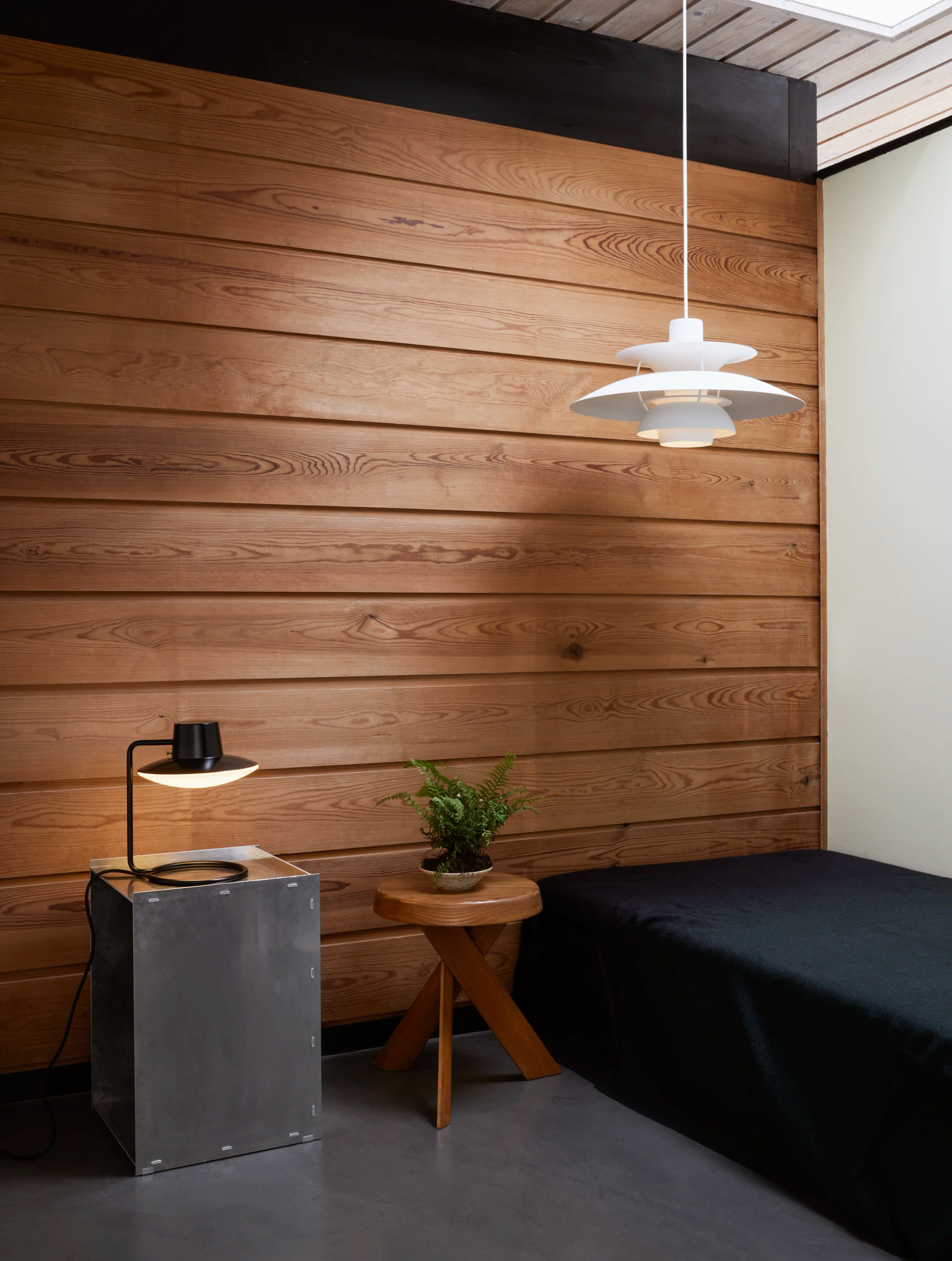 AJ Oxford in an official timber-lined room photograph