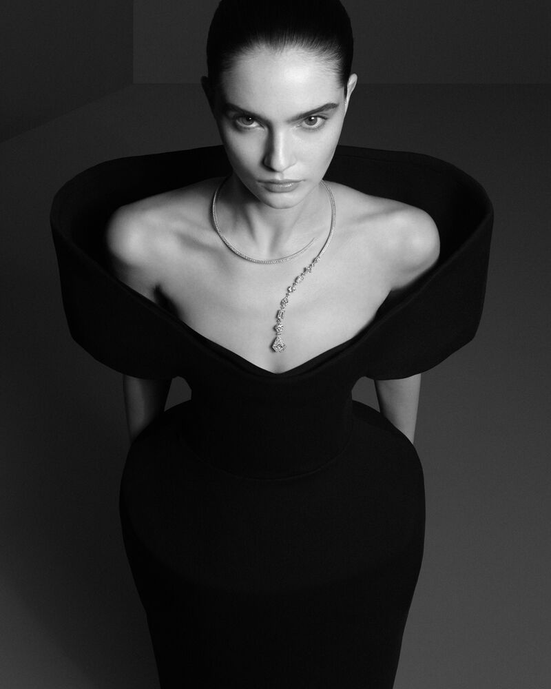 The Spark, an asymmetric diamond composition worn at the neckline