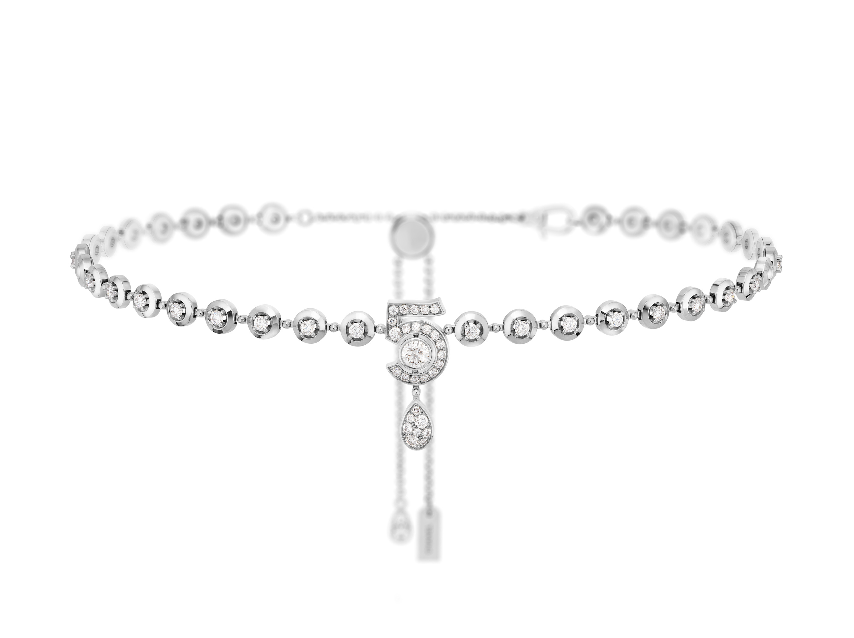 A diamond-line N°5 necklace, photographed as a complete object
