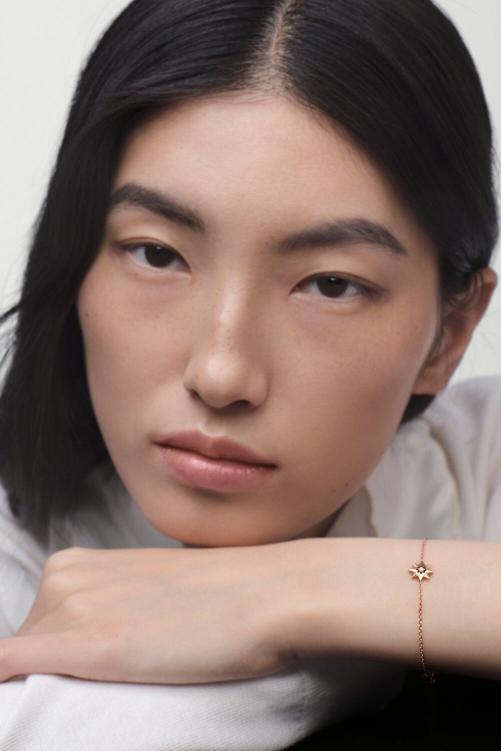 Rose des Vents bracelets shown on the wrist