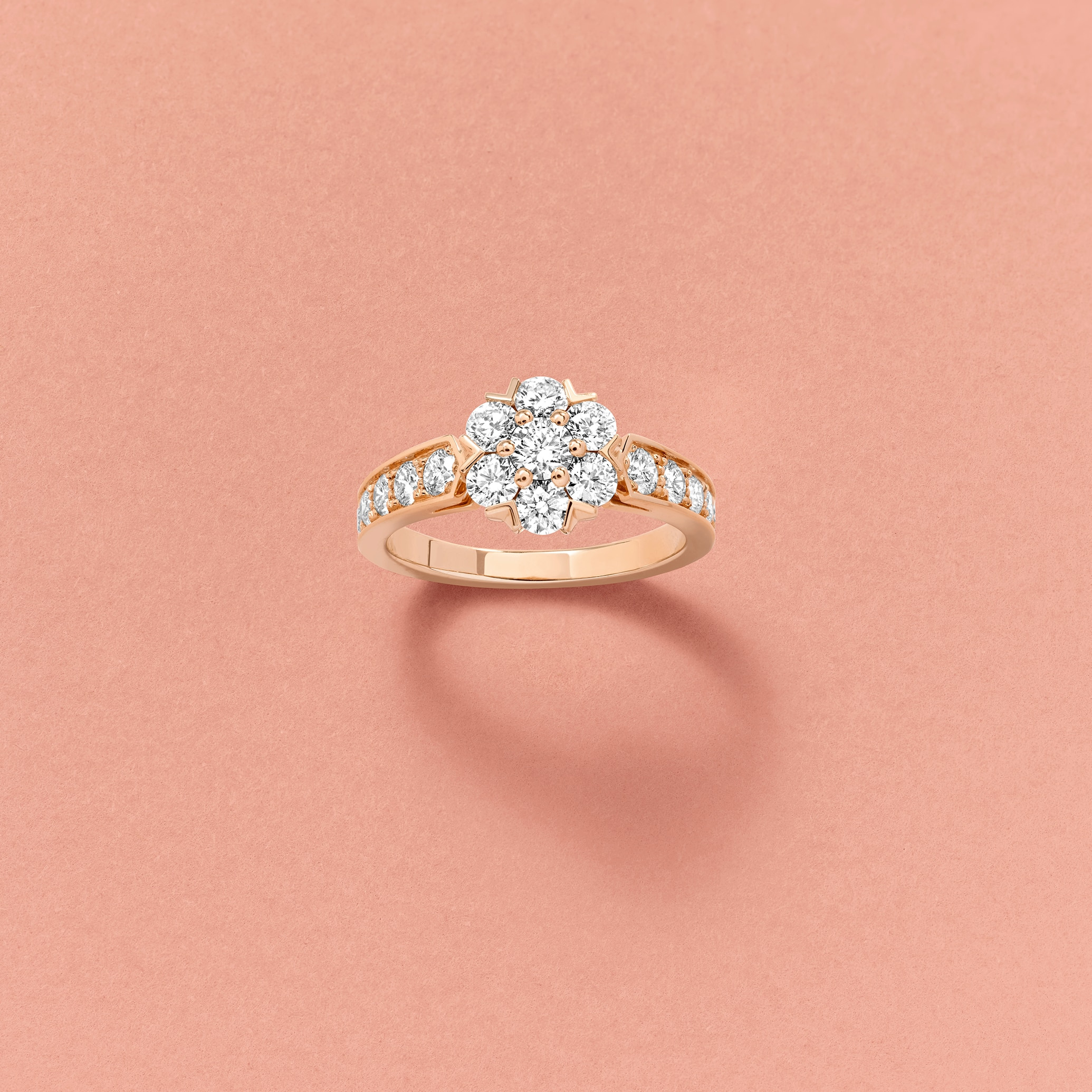A Fleurette ring against the collection’s pink display background