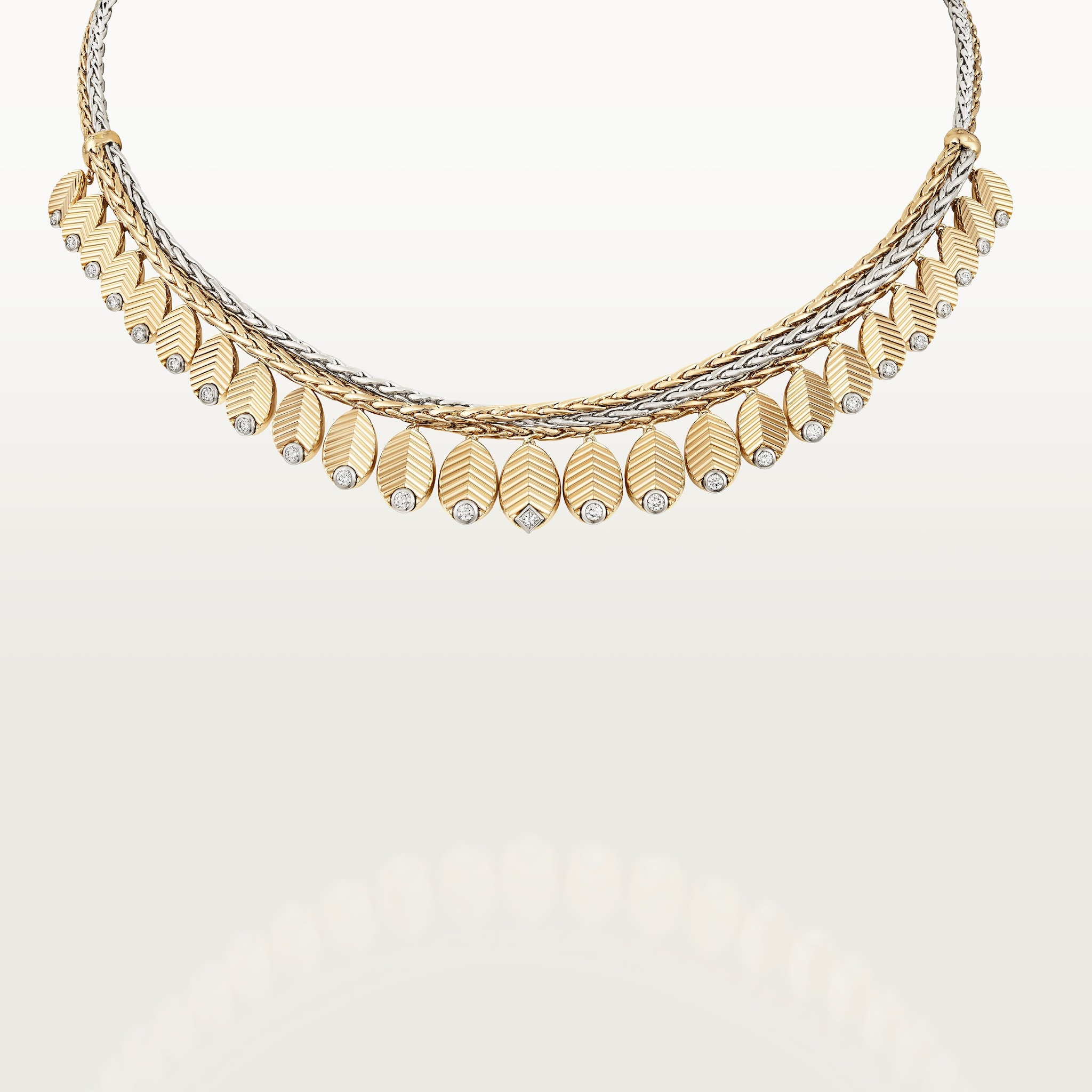A broader Grain de Café necklace, distinct from the smaller pendant