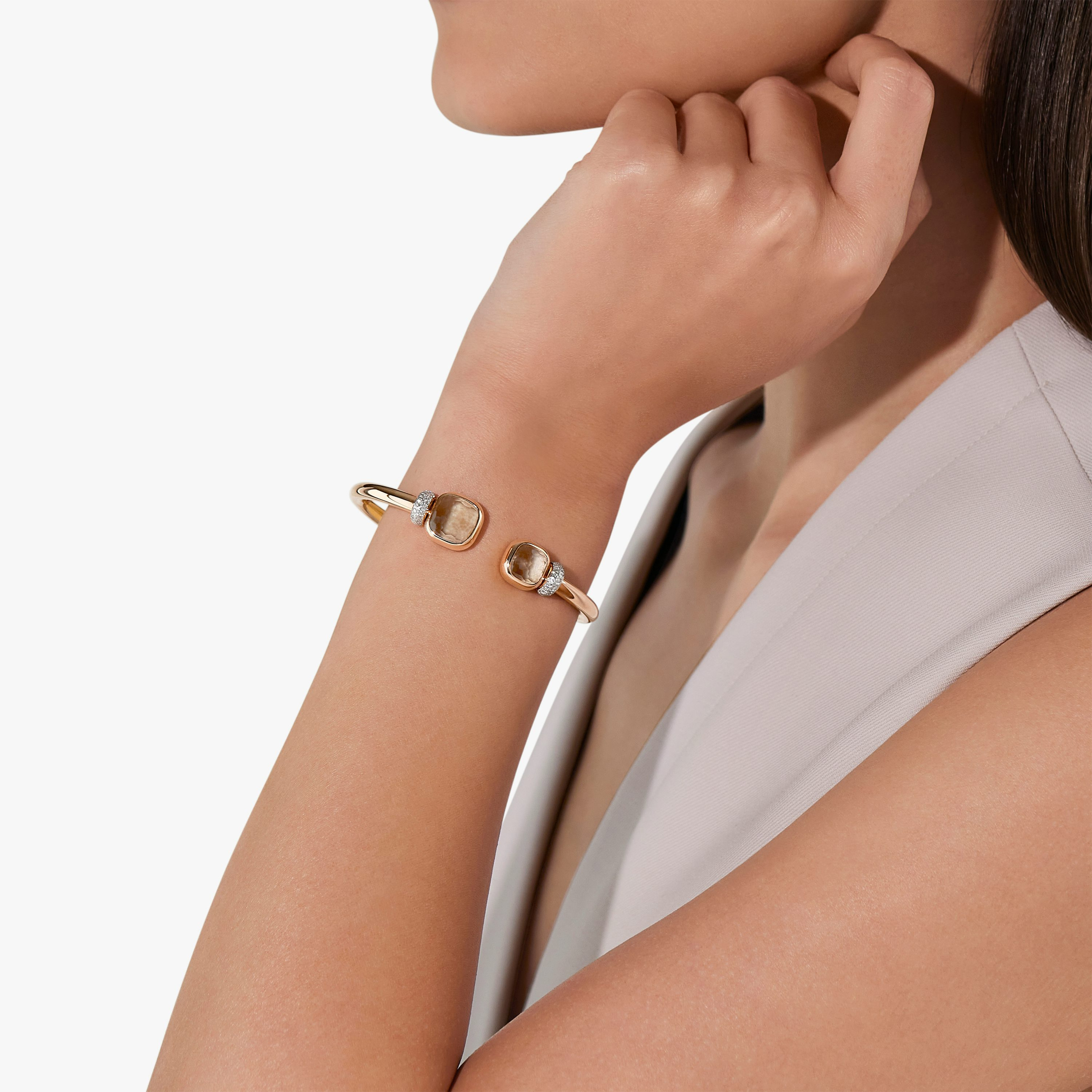 The Nudo prasiolite open bangle worn at the wrist