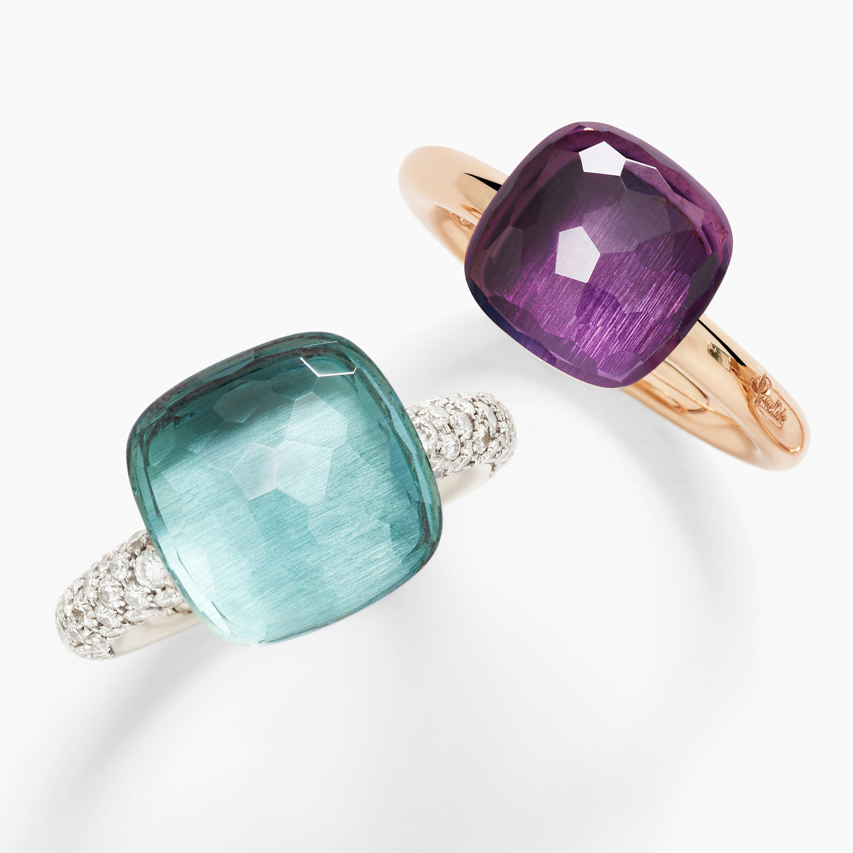 Two rings from the broader Nudo collection, shown for design context rather than as the featured bangle