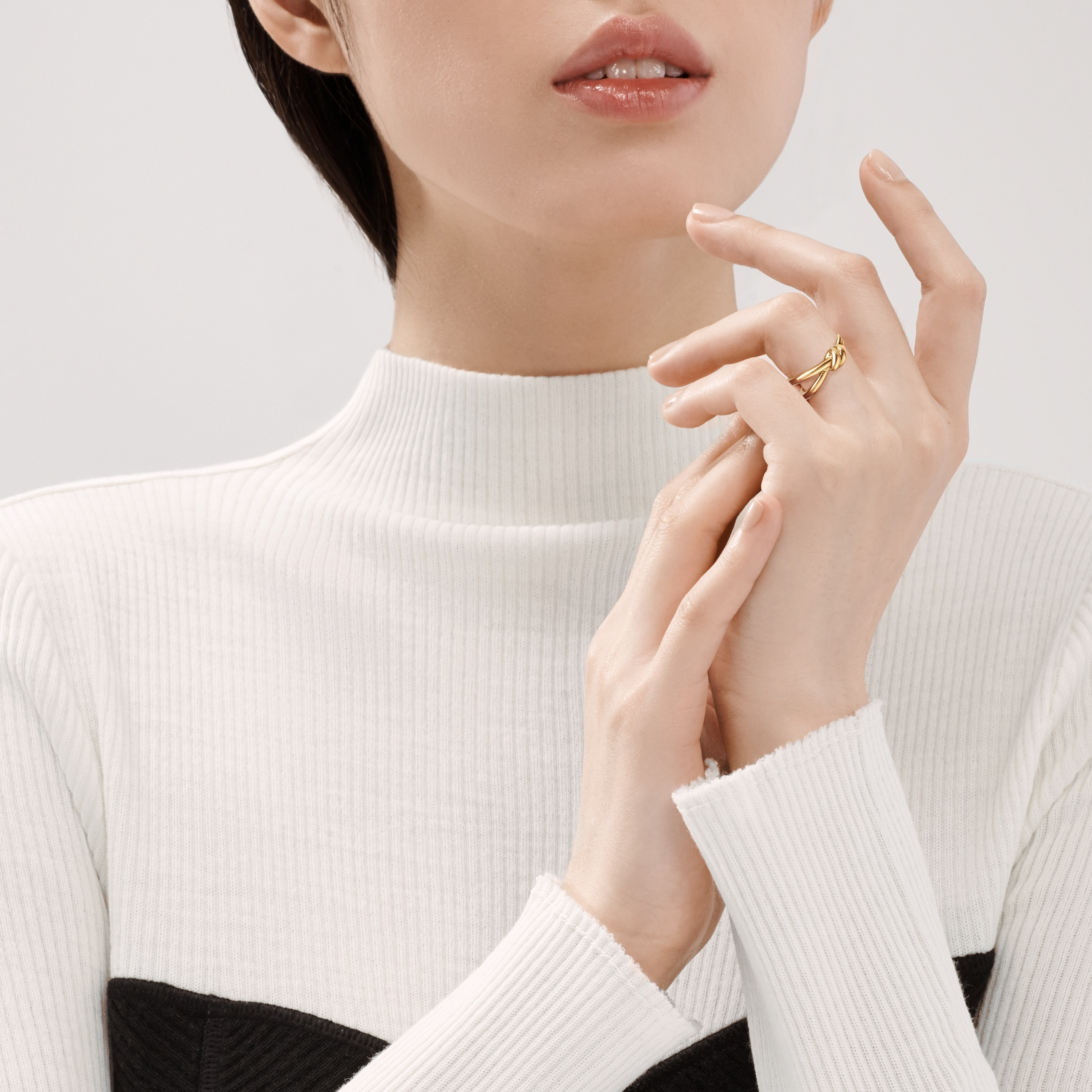 Tiffany Knot ring worn at the hand