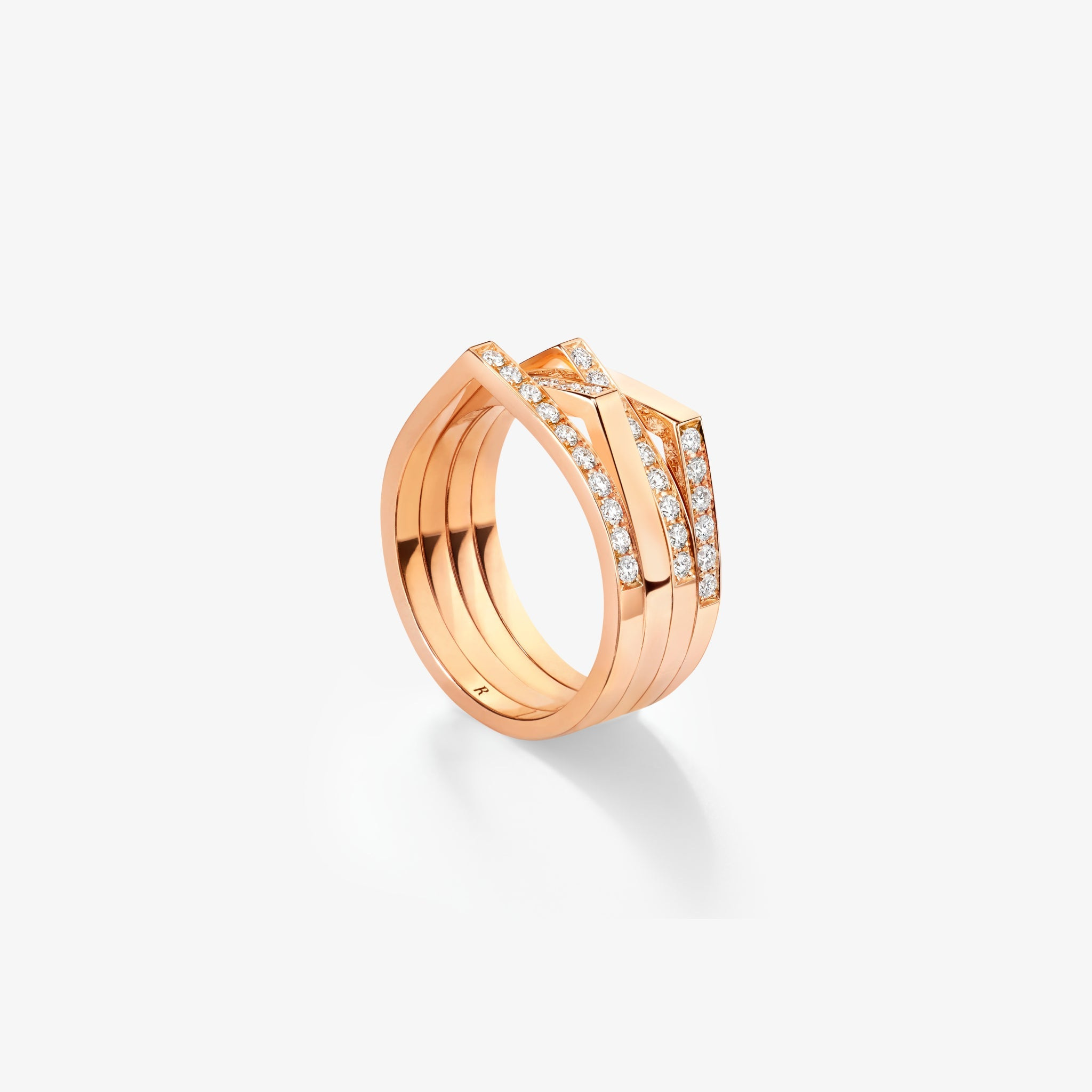 A multi-row diamond-set Antifer ring, photographed as a complete object