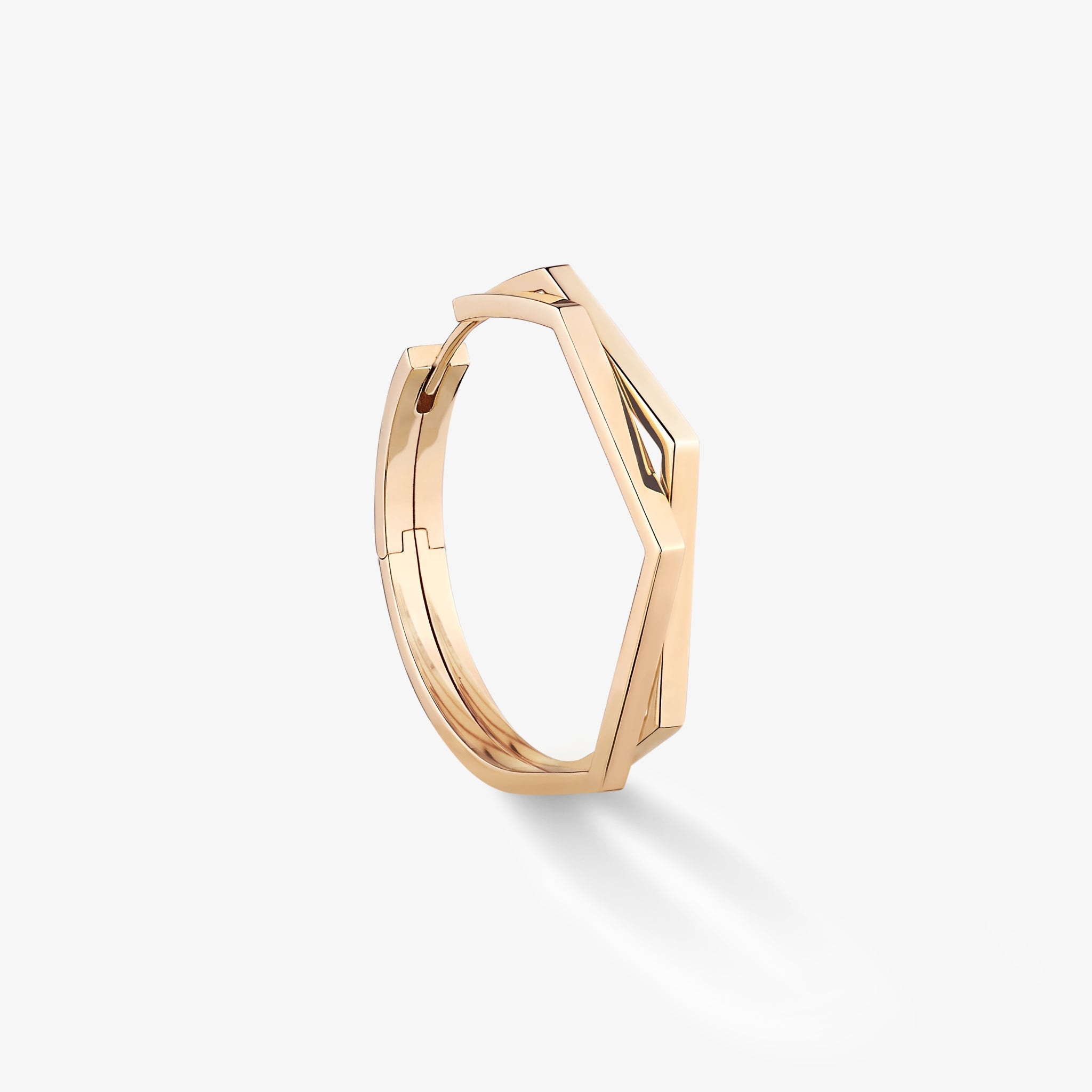 An Antifer earring with a broader geometric outline