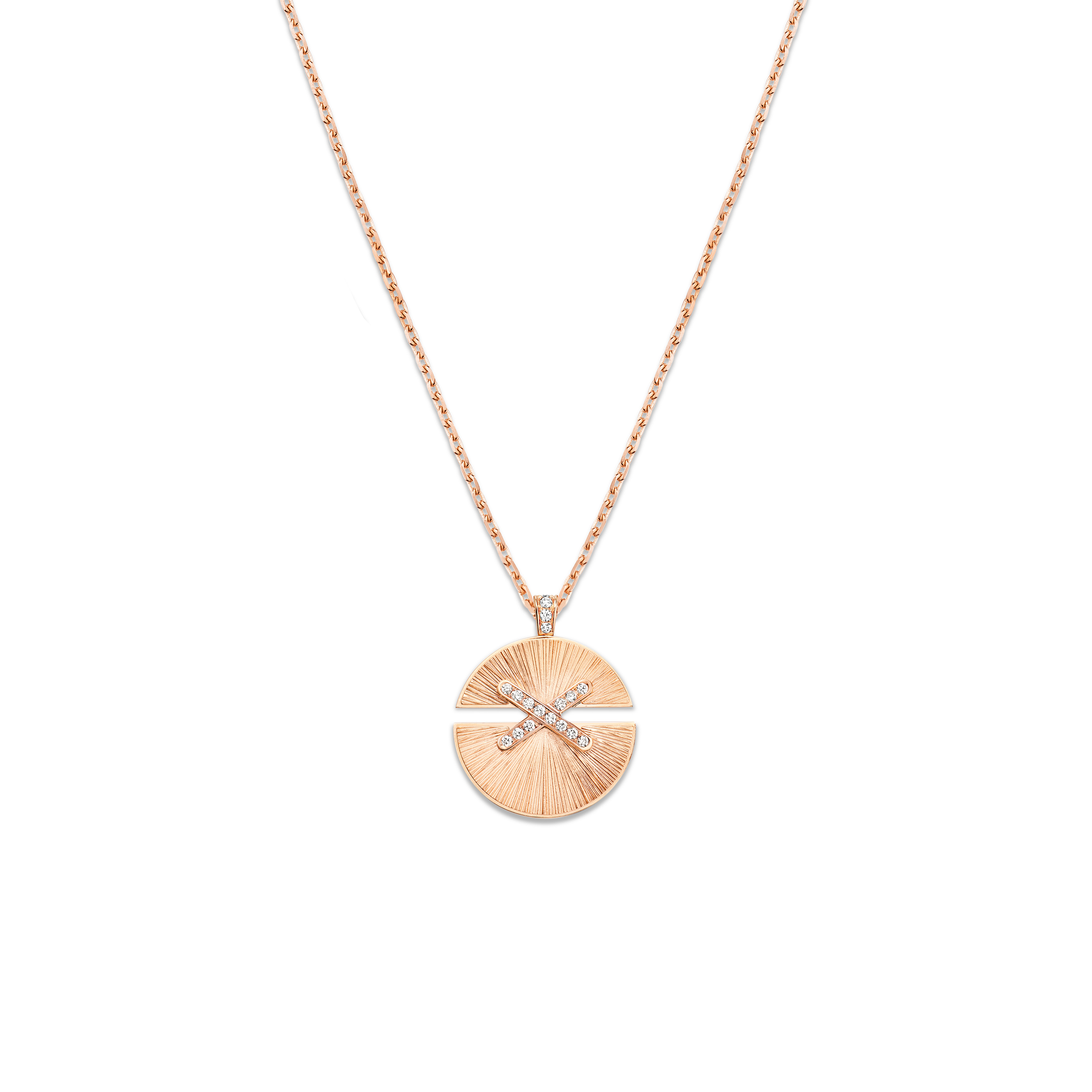 A circular Liens Harmonie pendant, distinct from the crossed motif