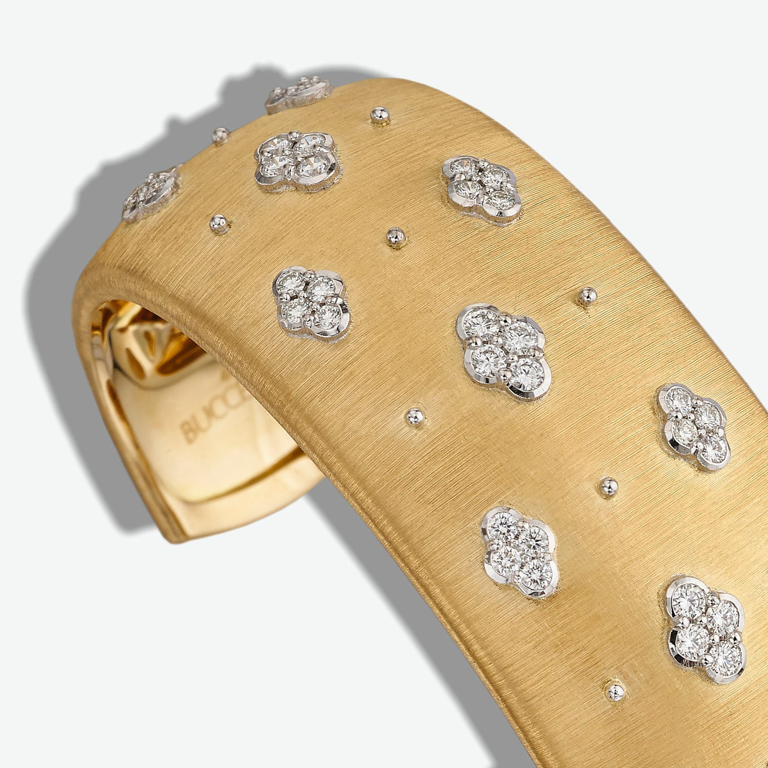 Buccellati Macri: Reading the Lines in Hand-Engraved Gold: Macri AB cuff photographed as a complete object, distinct from Macri Classica Official illustration; not a private object or commissioned examination.