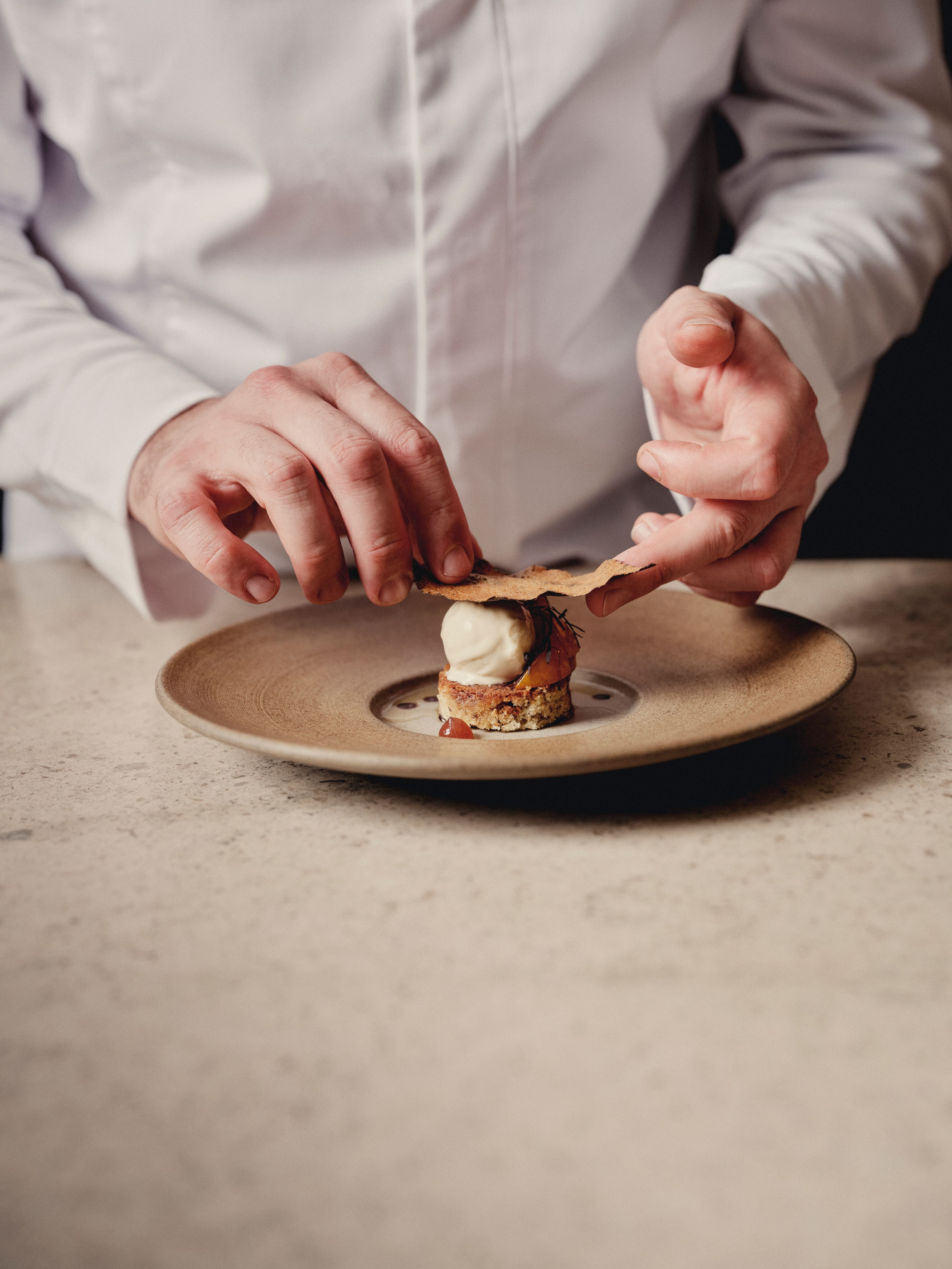 Food preparation from Belmond’s official Britannic Explorer culinary imagery.