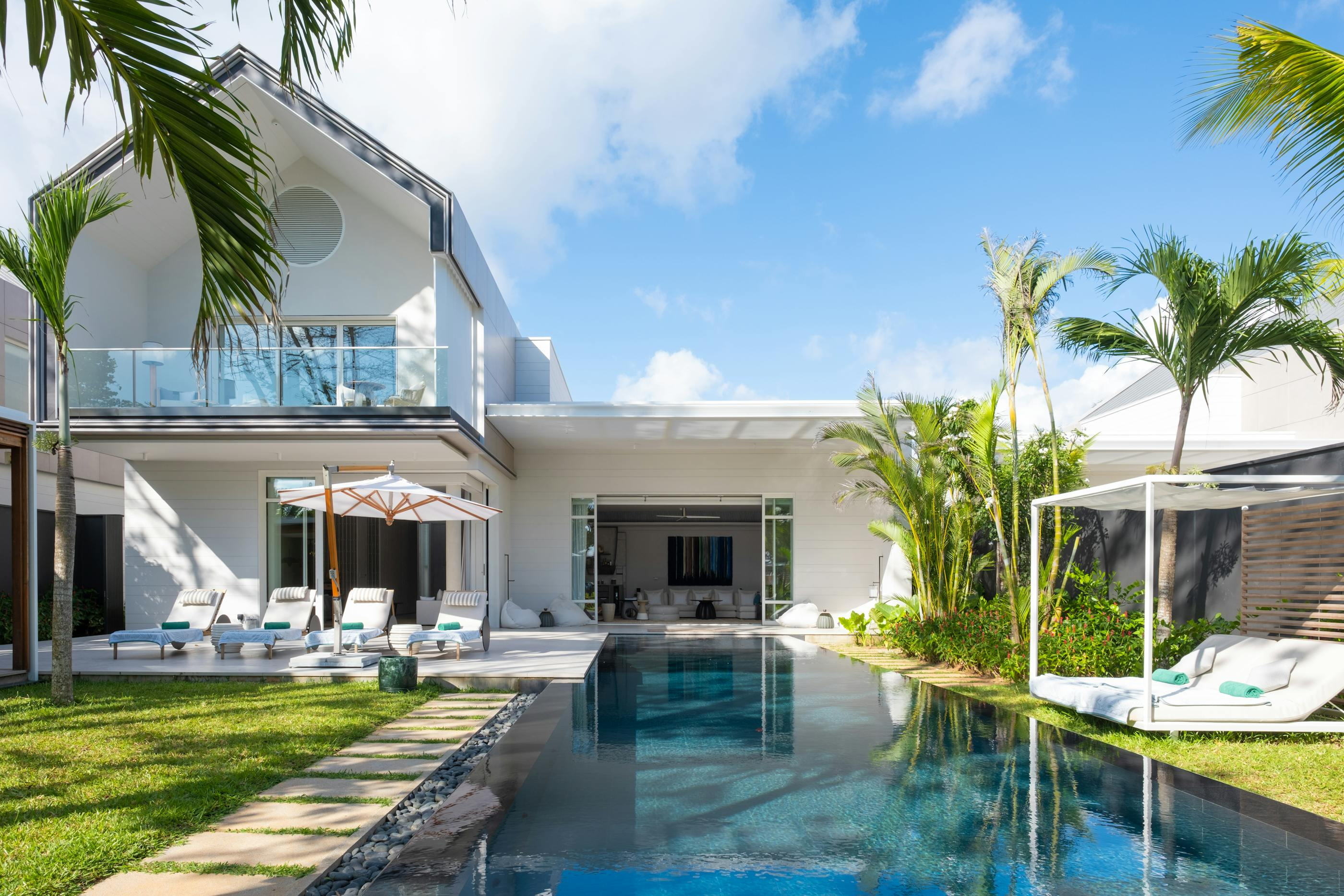 Beach-villa architecture, garden and pool in the official Cheval Blanc Seychelles gallery.