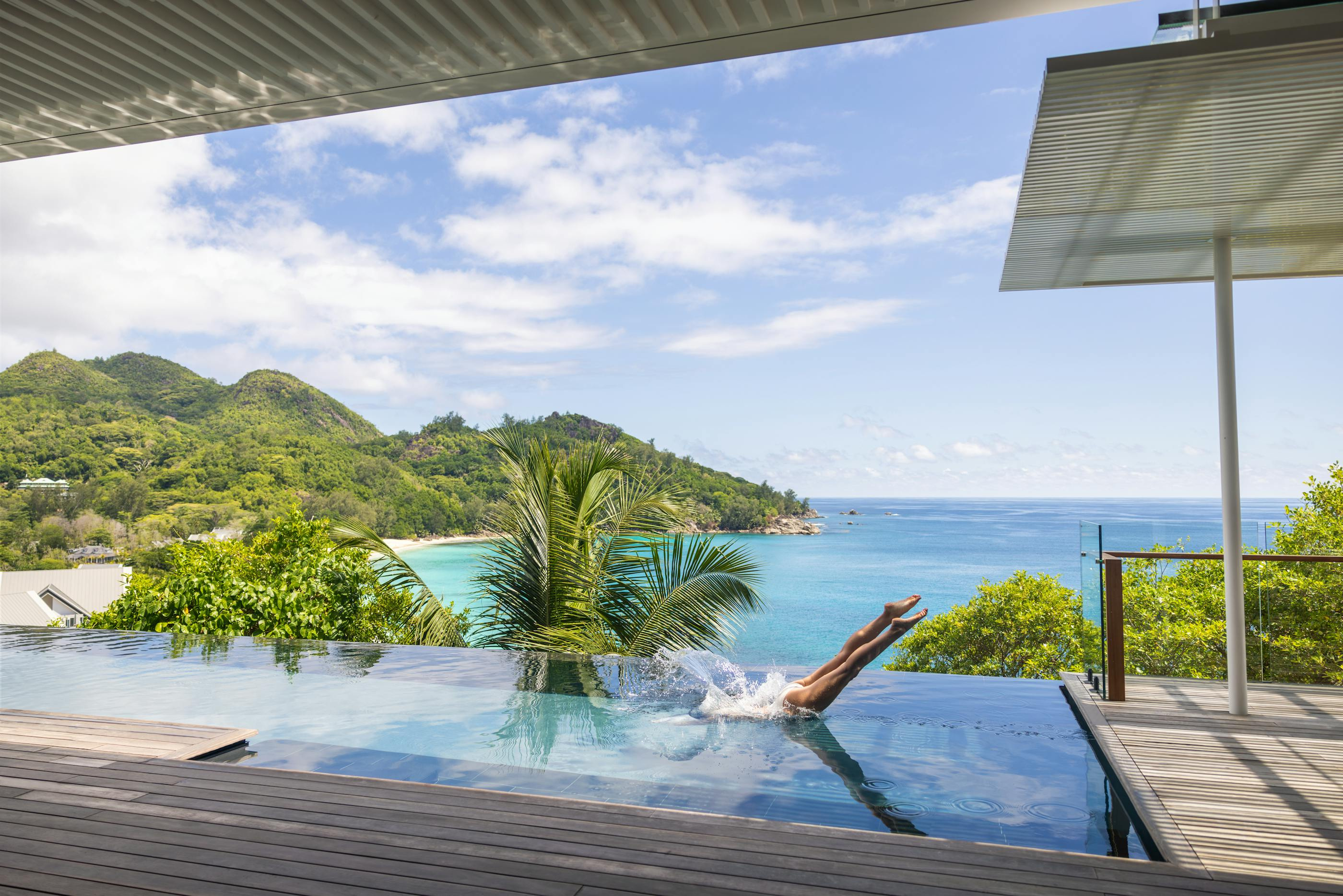 Hillside terrace and pool overlooking Anse Intendance.