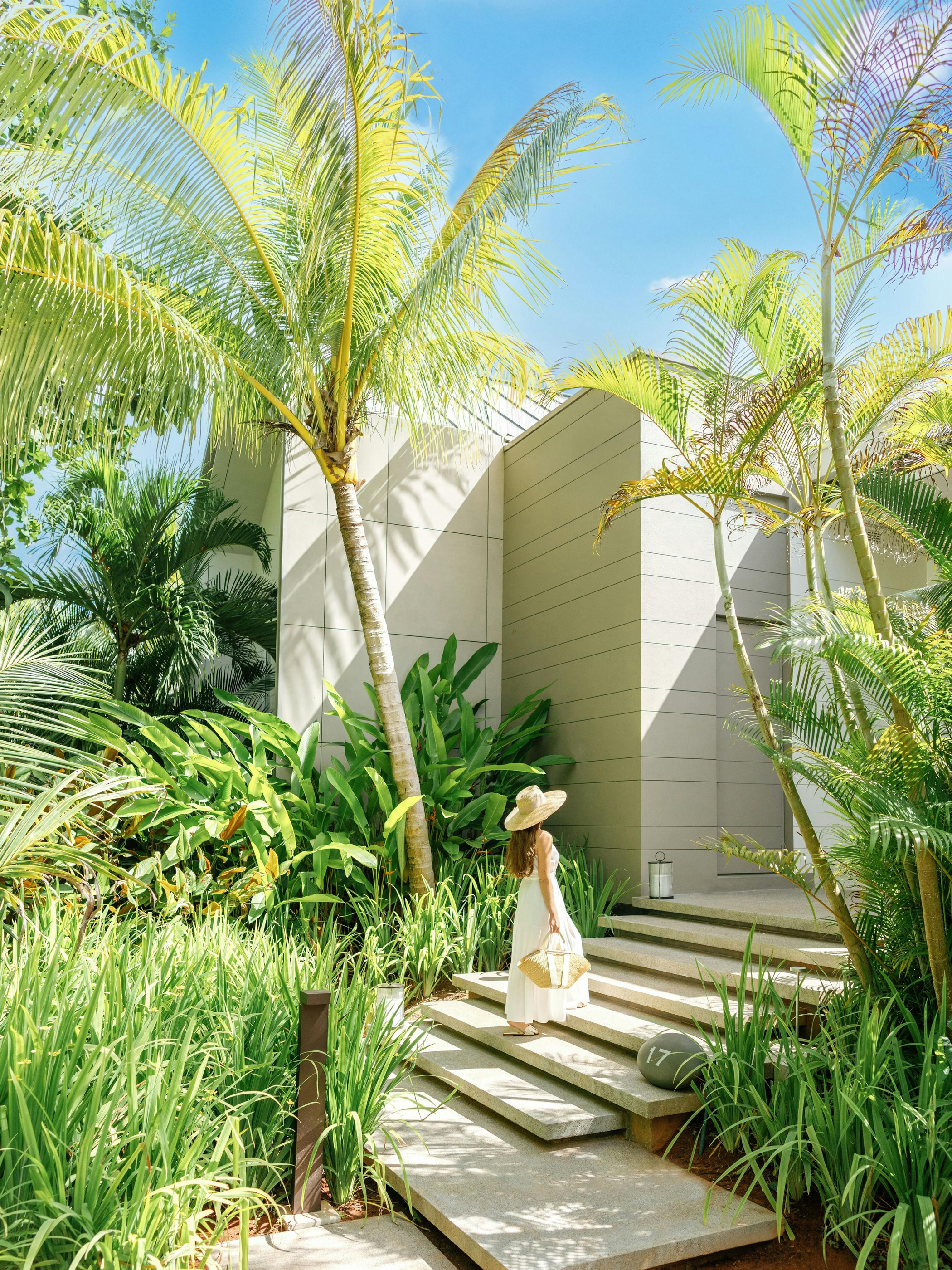 Steps and planting within the beach-villa setting.