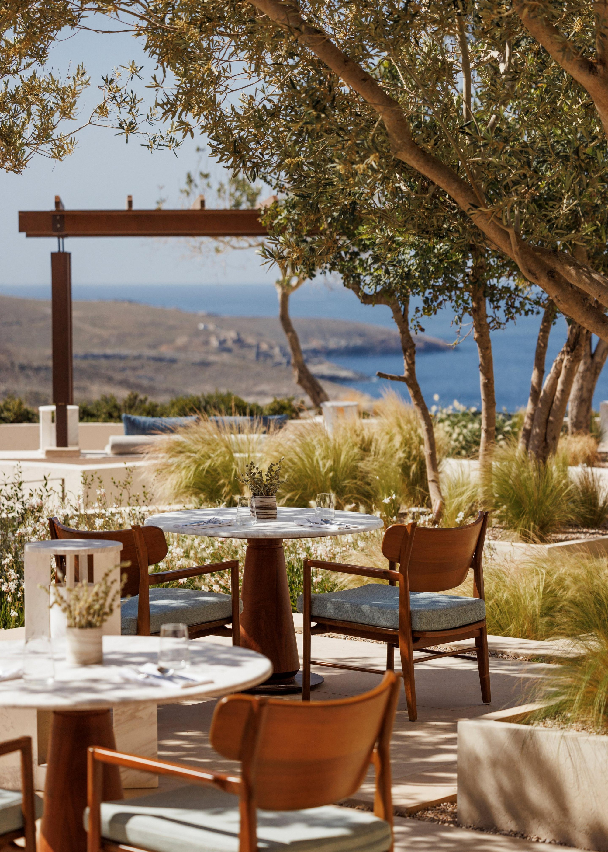 An open-air dining setting within One&Only Kéa Island.