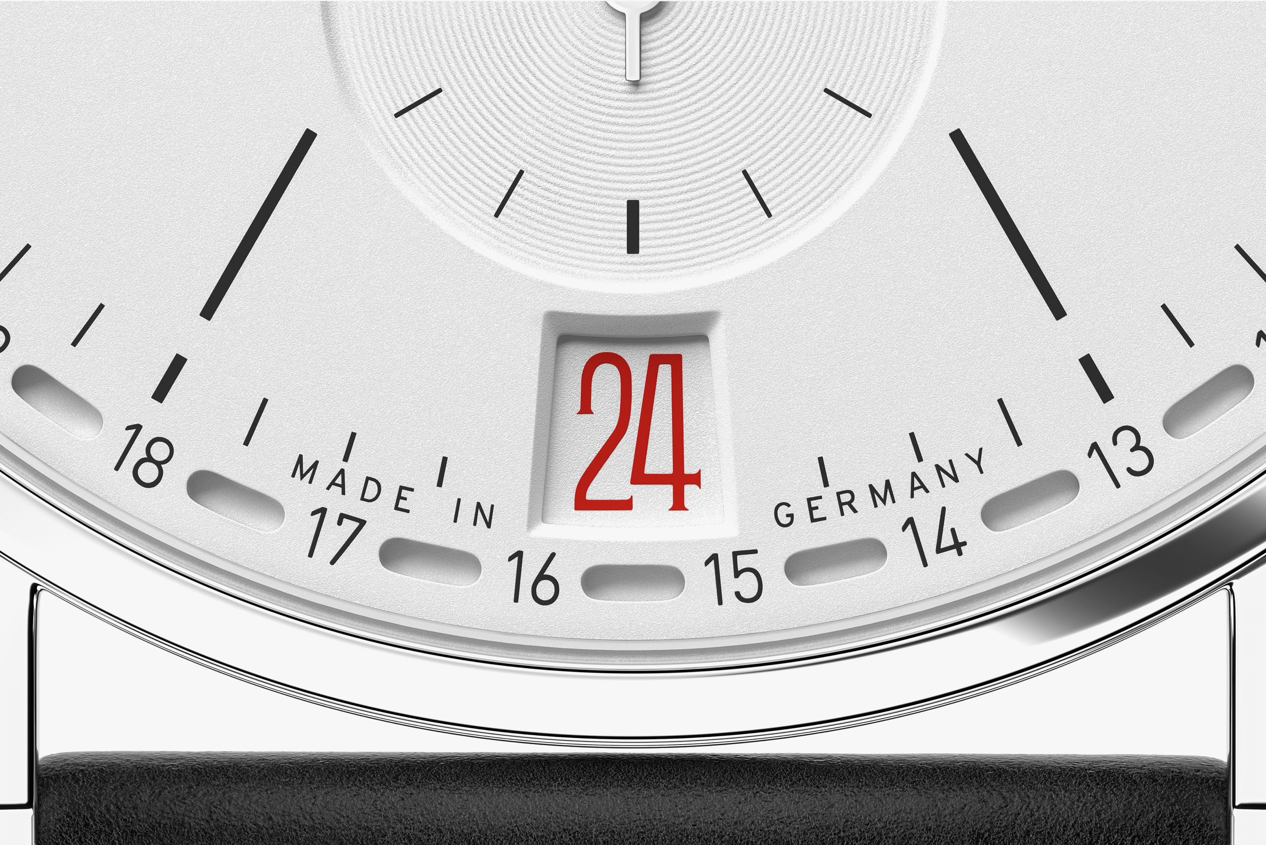 The date window and red date-ring markers, shown in an official detail view.