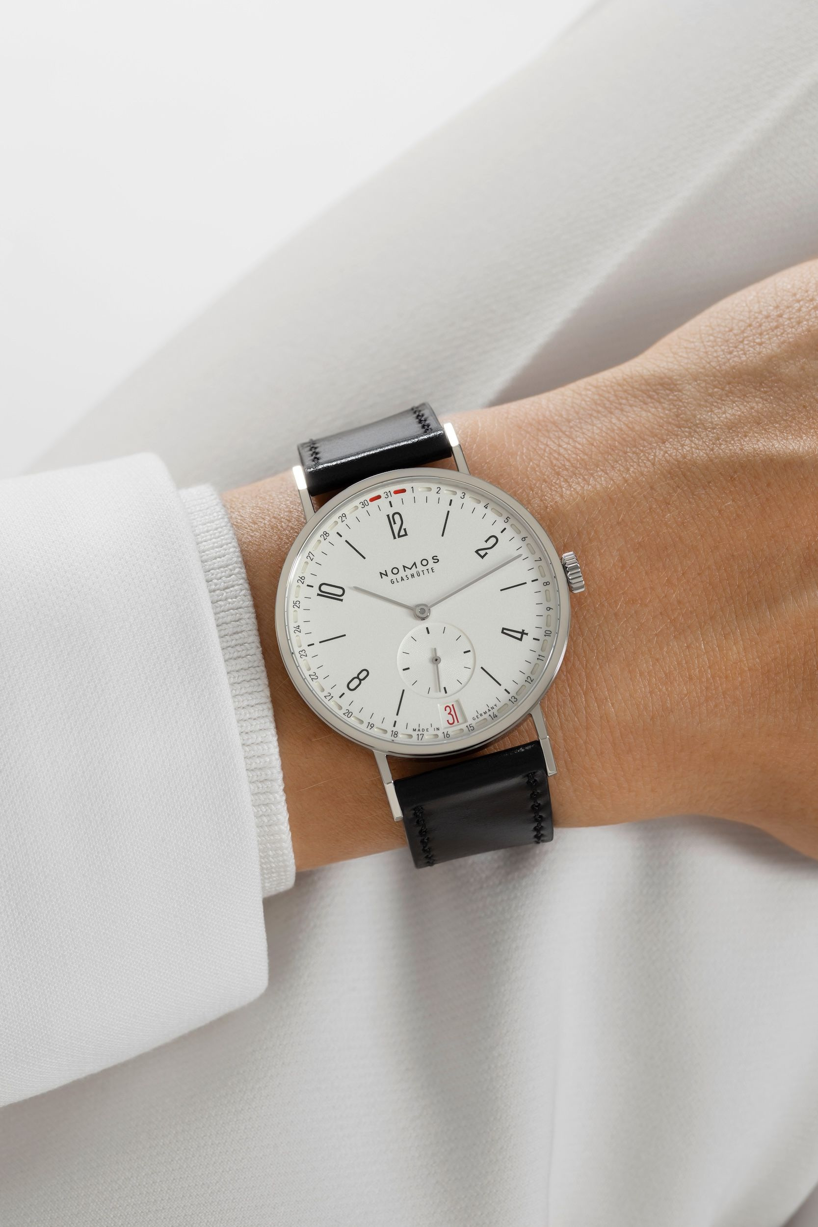 Tangente 2date reference 135 in a second official wrist composition.
