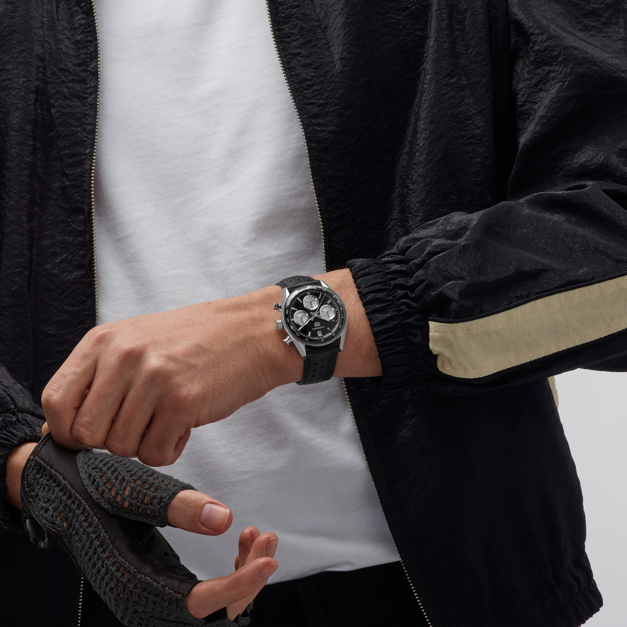 The black 39 mm Carrera Glassbox CBS2210.FC6534 on the wrist.