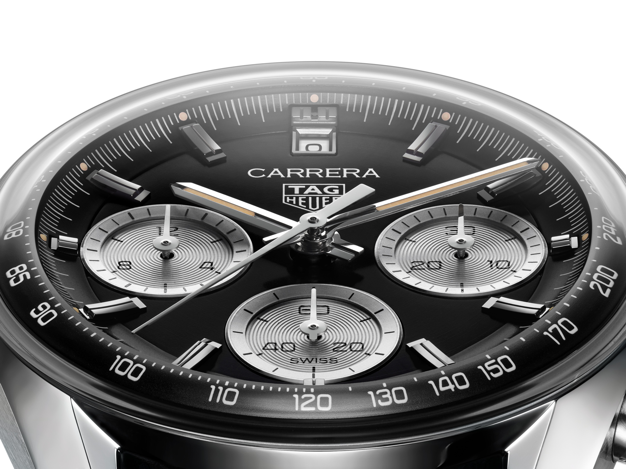 The curved outer dial scale beneath the glass of the black Carrera Glassbox.