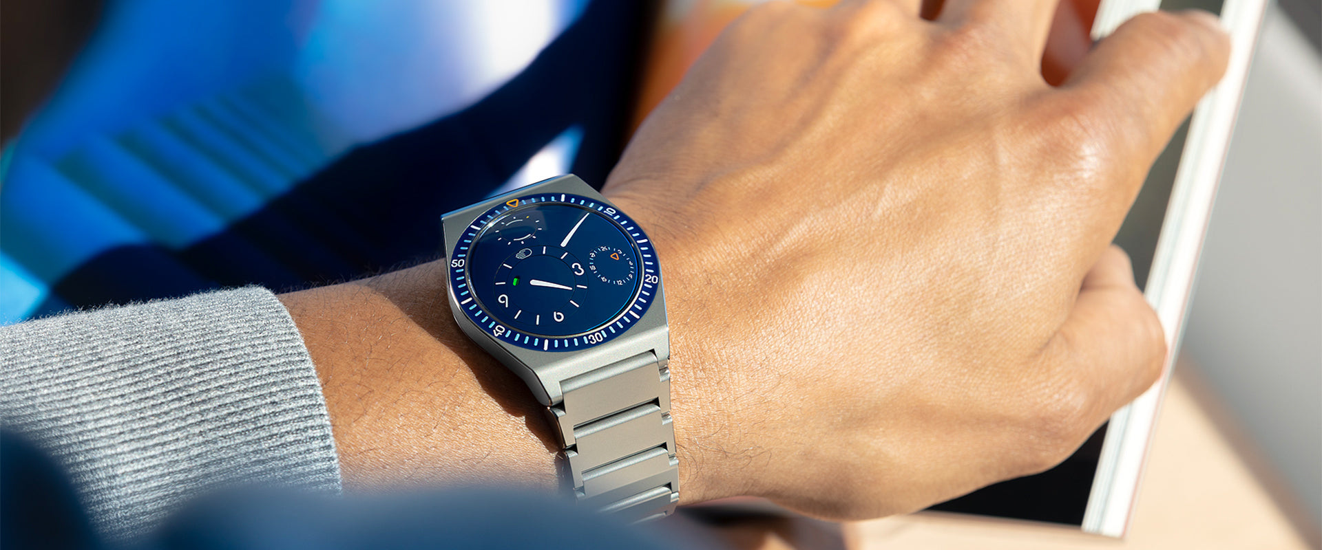 Blue TYPE 7 on the wrist, from the official collection imagery.