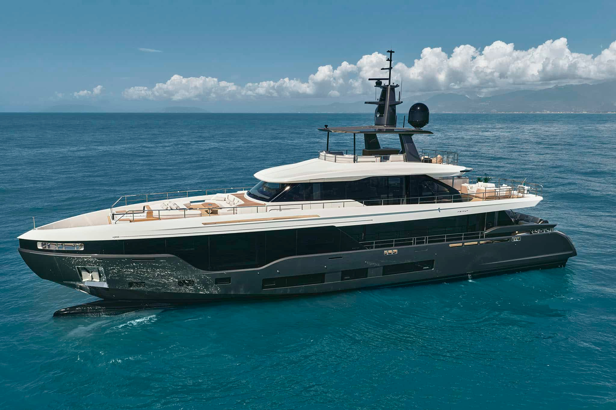 Grande 36M viewed across the water, with its inhabited upper levels.