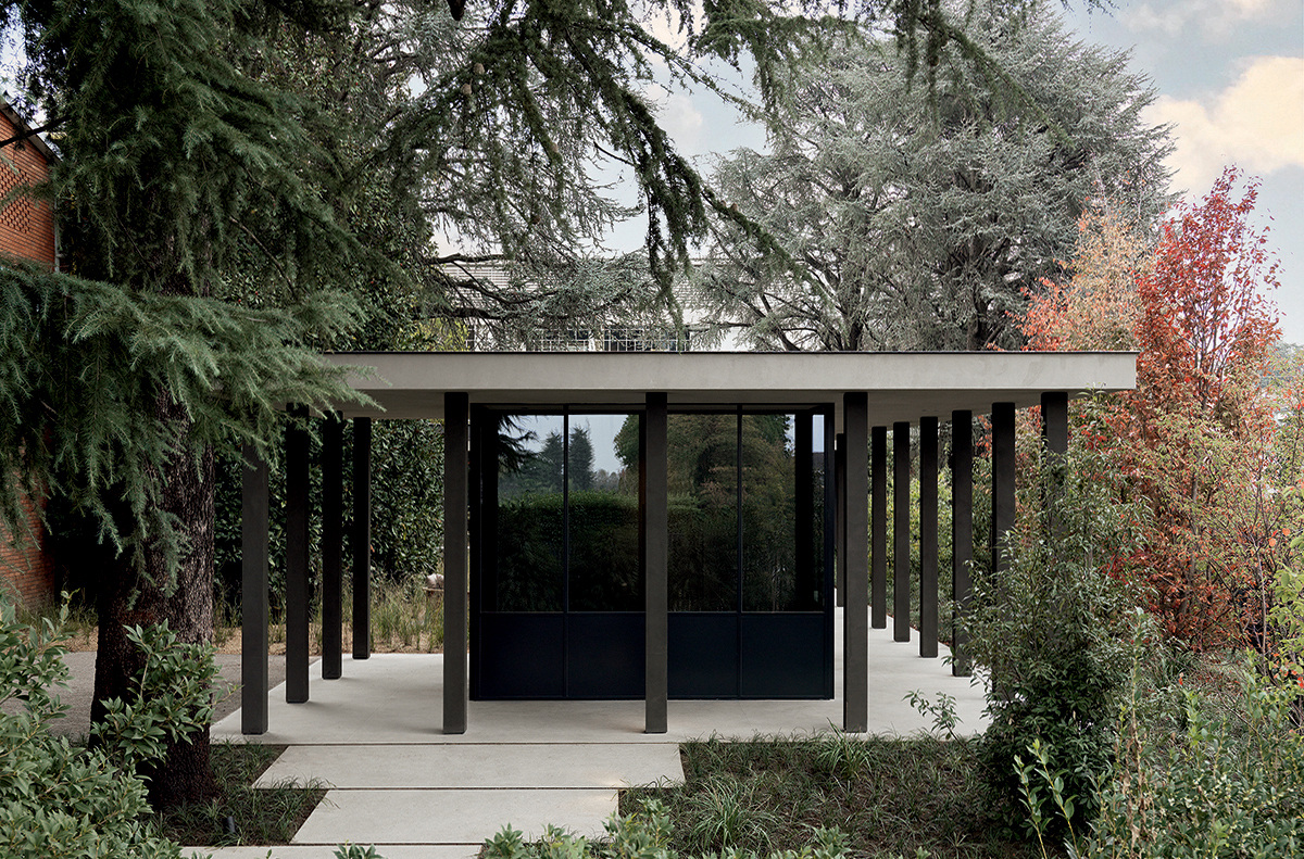 Molteni&C Pavilion in its planted setting. Photograph by Max Zambelli, courtesy Vincent Van Duysen.