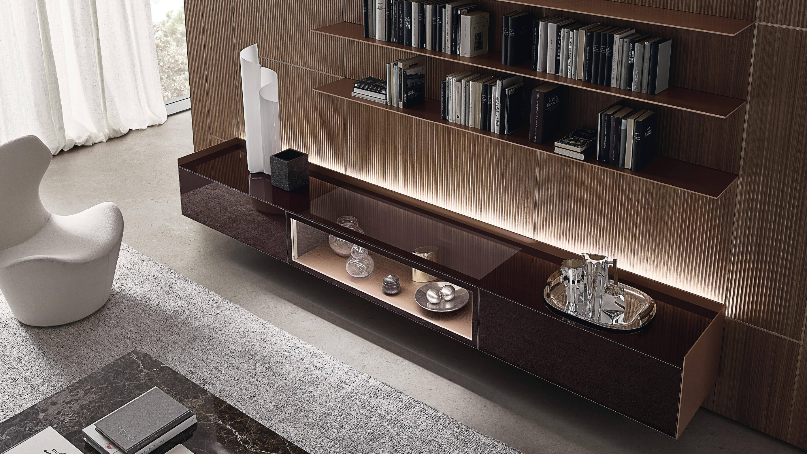 A higher viewpoint shows shelves and suspended storage within the wall composition.