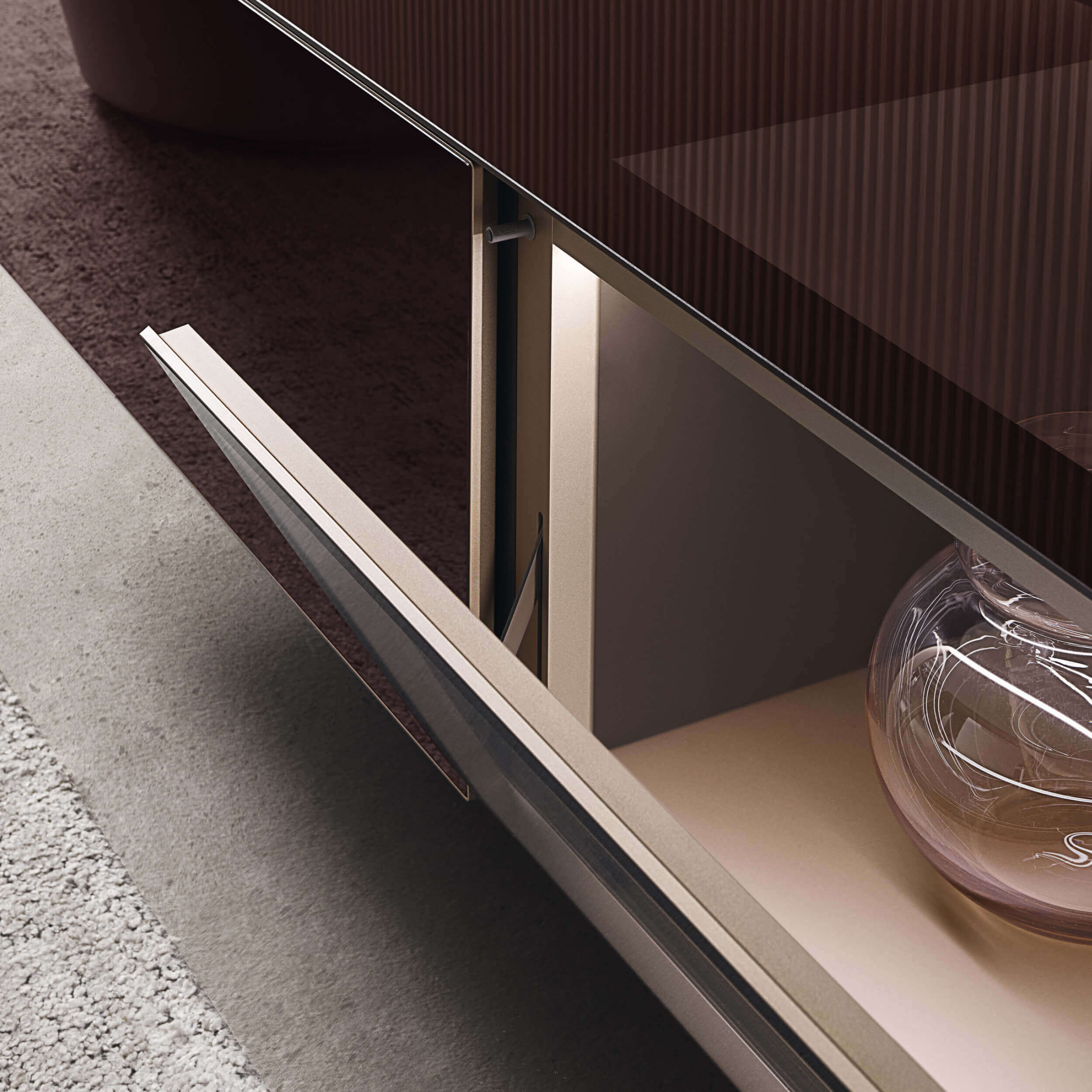Rimadesio Modulor: When the Wall Becomes the Interior: A detail of suspended storage against the panelled wall. Official illustration; not a private object or commissioned examination.