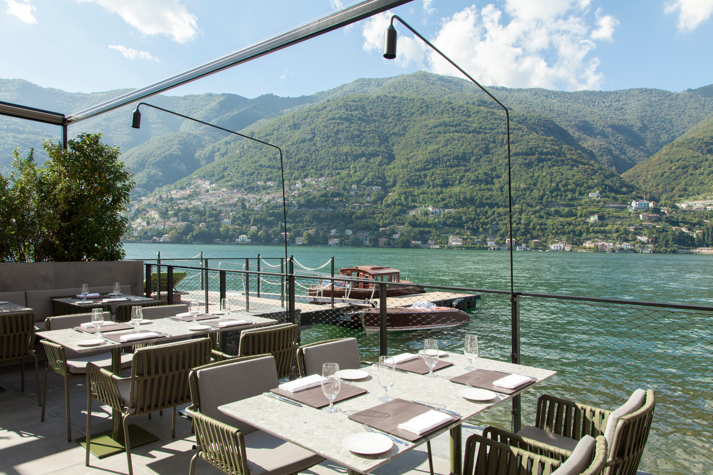 Dining on the terrace beside the lake.