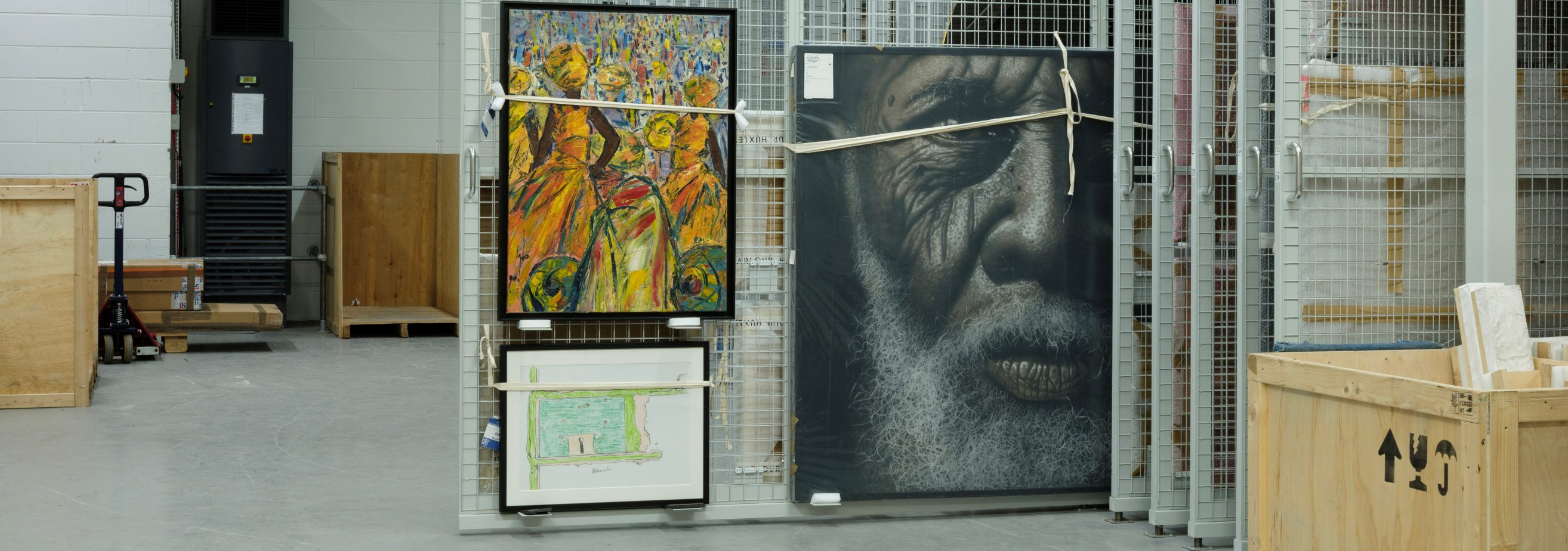 Gander & White published storage view with paintings and crates; the image illustrates records and custody in context.