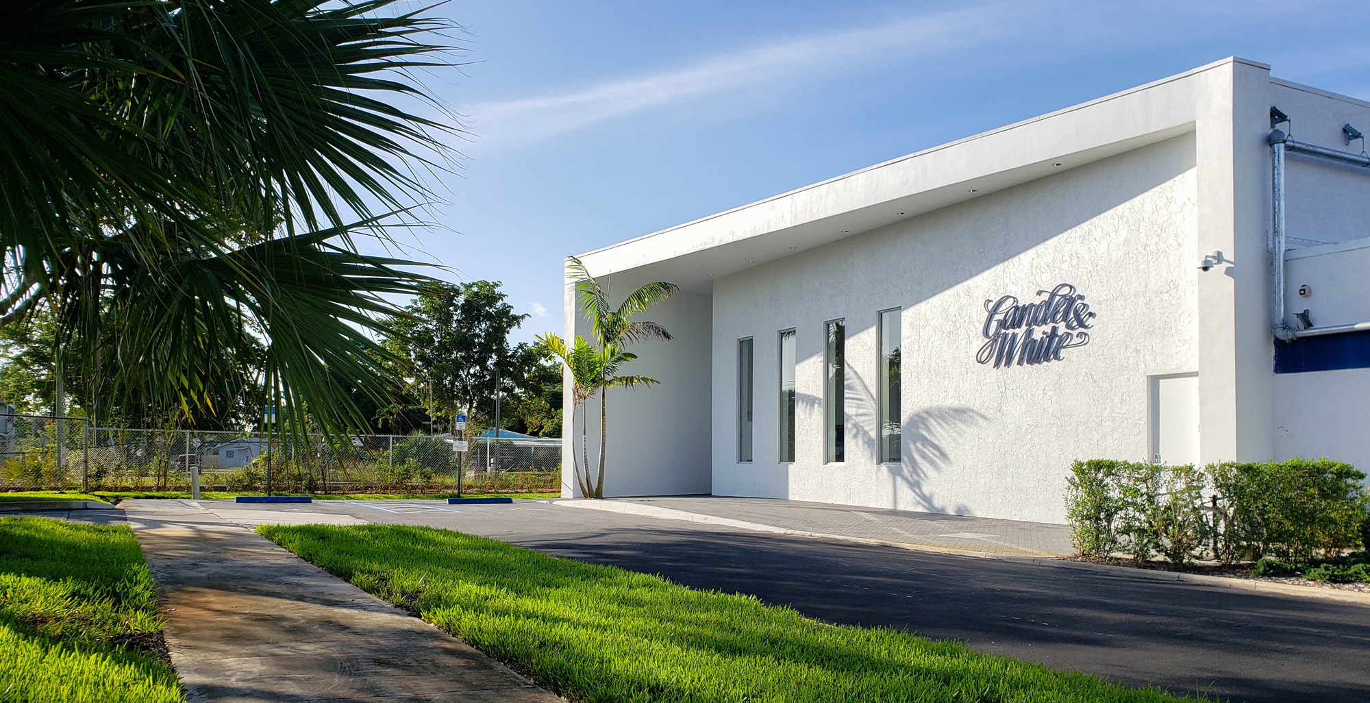 Gander & White published storage-facility exterior with landscaping.