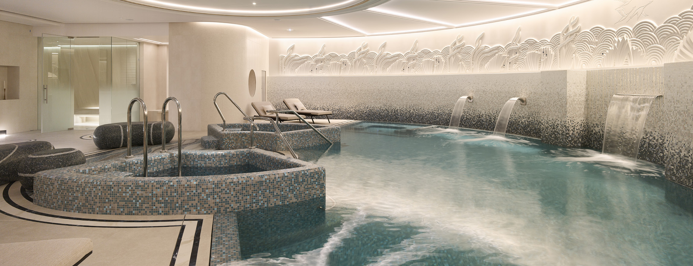 The shared indoor pool at Le Provençal in the official Crestron case study.